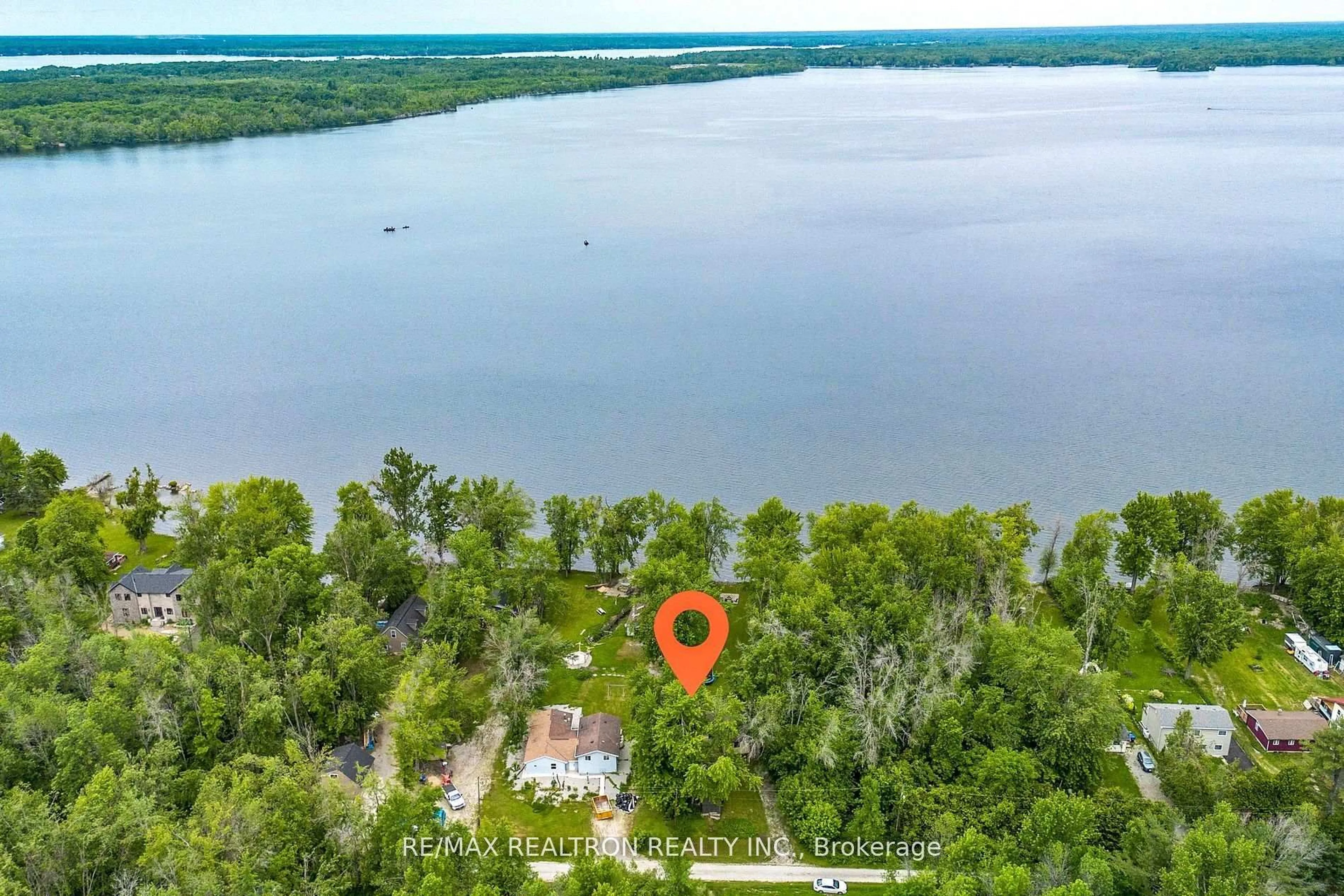 A pic from outside/outdoor area/front of a property/back of a property/a pic from drone, water/lake/river/ocean view for 6090 Sheba Dr, Ramara Ontario L3V 6H3