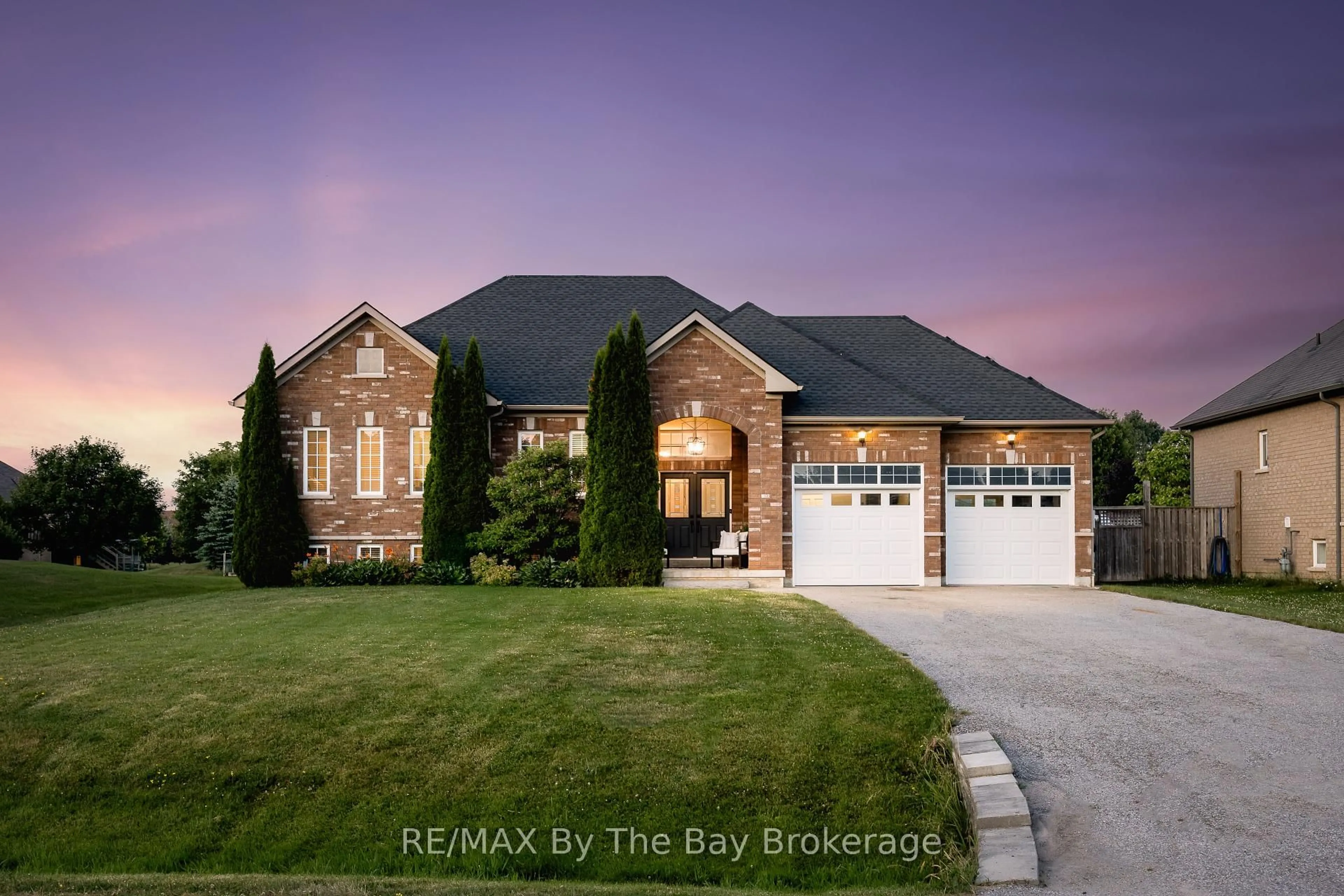 Home with brick exterior material, street for 11 Basswood Dr, Wasaga Beach Ontario L9Z 0A9