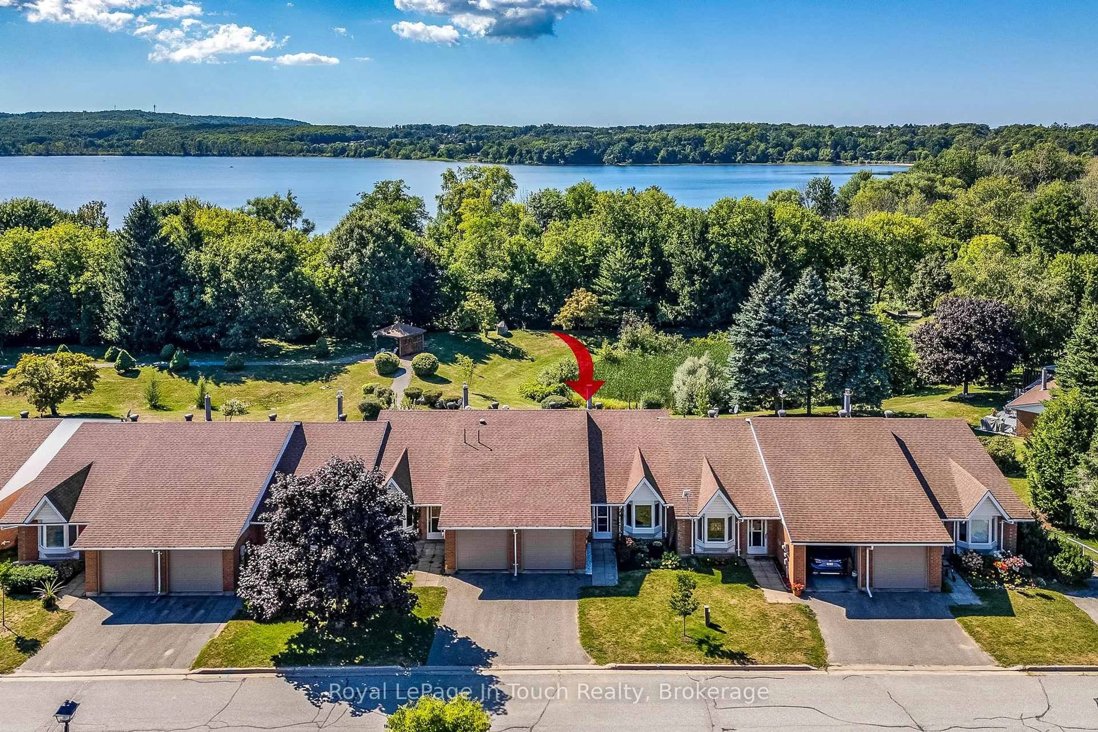 A pic from outside/outdoor area/front of a property/back of a property/a pic from drone, water/lake/river/ocean view for 696 King St #32, Midland Ontario L4R 5B5