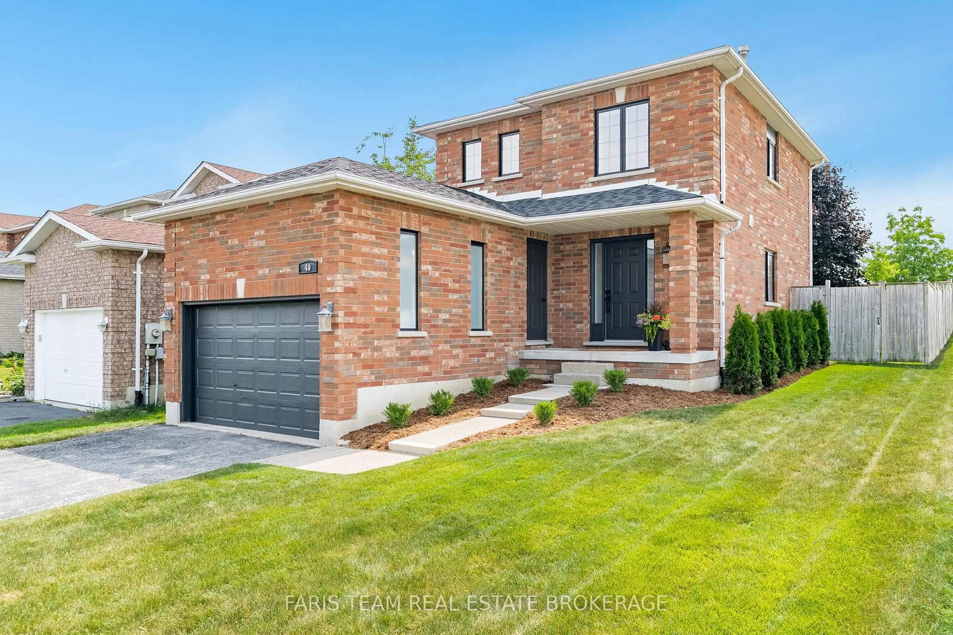 Home with brick exterior material, street for 40 Brown Wood Dr, Barrie Ontario L4M 6N5