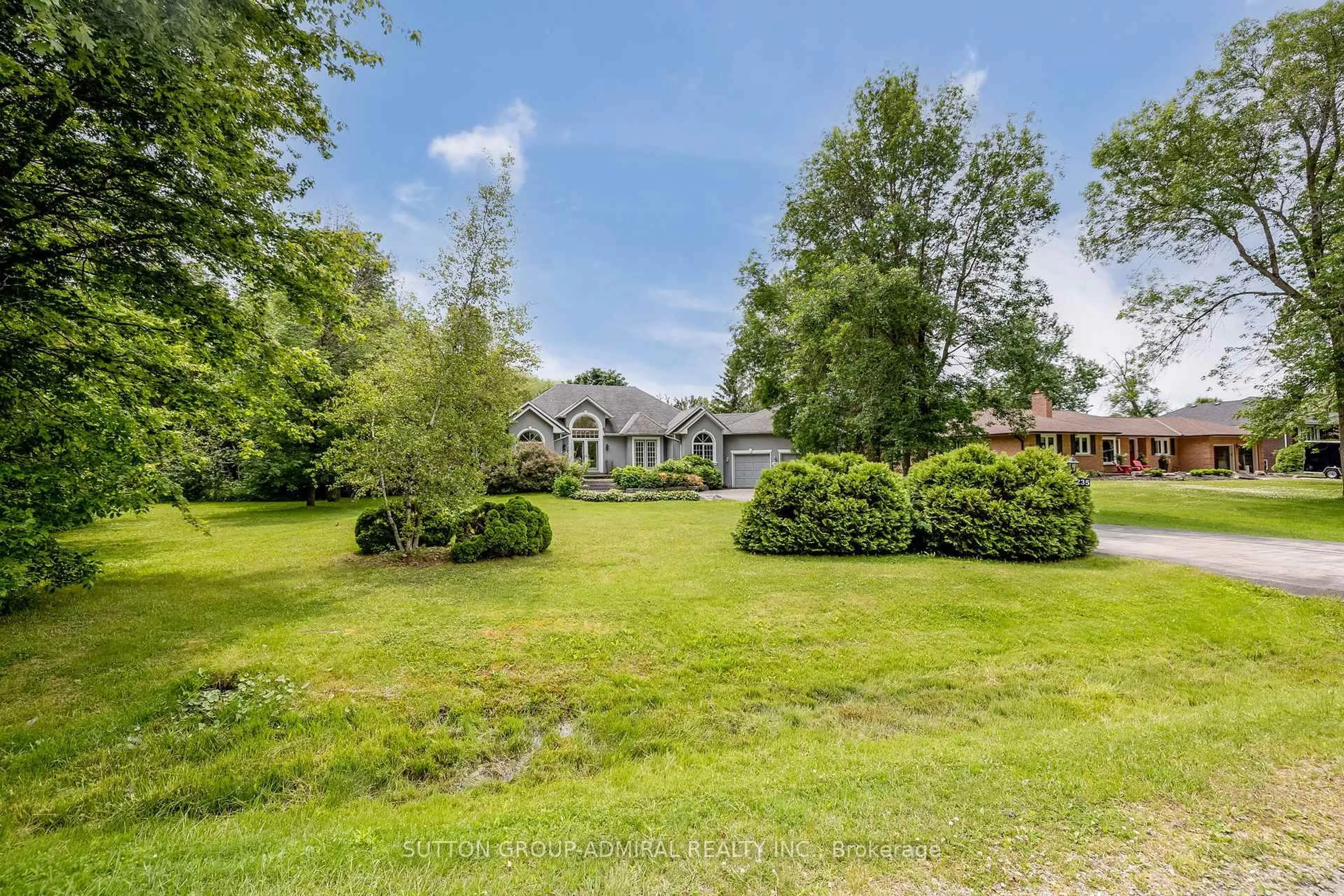 A pic from outside/outdoor area/front of a property/back of a property/a pic from drone, water/lake/river/ocean view for 235 Bayshore Drive, Rr 3 Dr, Ramara Ontario L0K 1B0