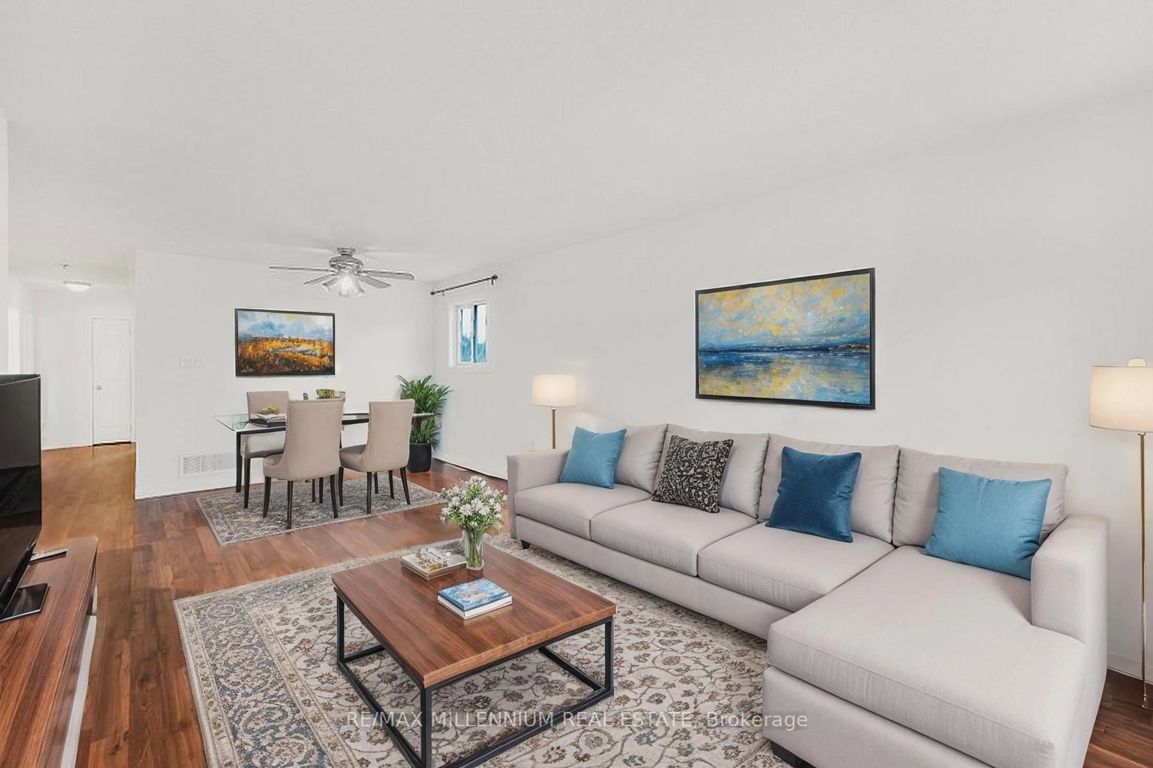 Living room with furniture, wood/laminate floor for 44 Hanmer St, Barrie Ontario L4M 6V1