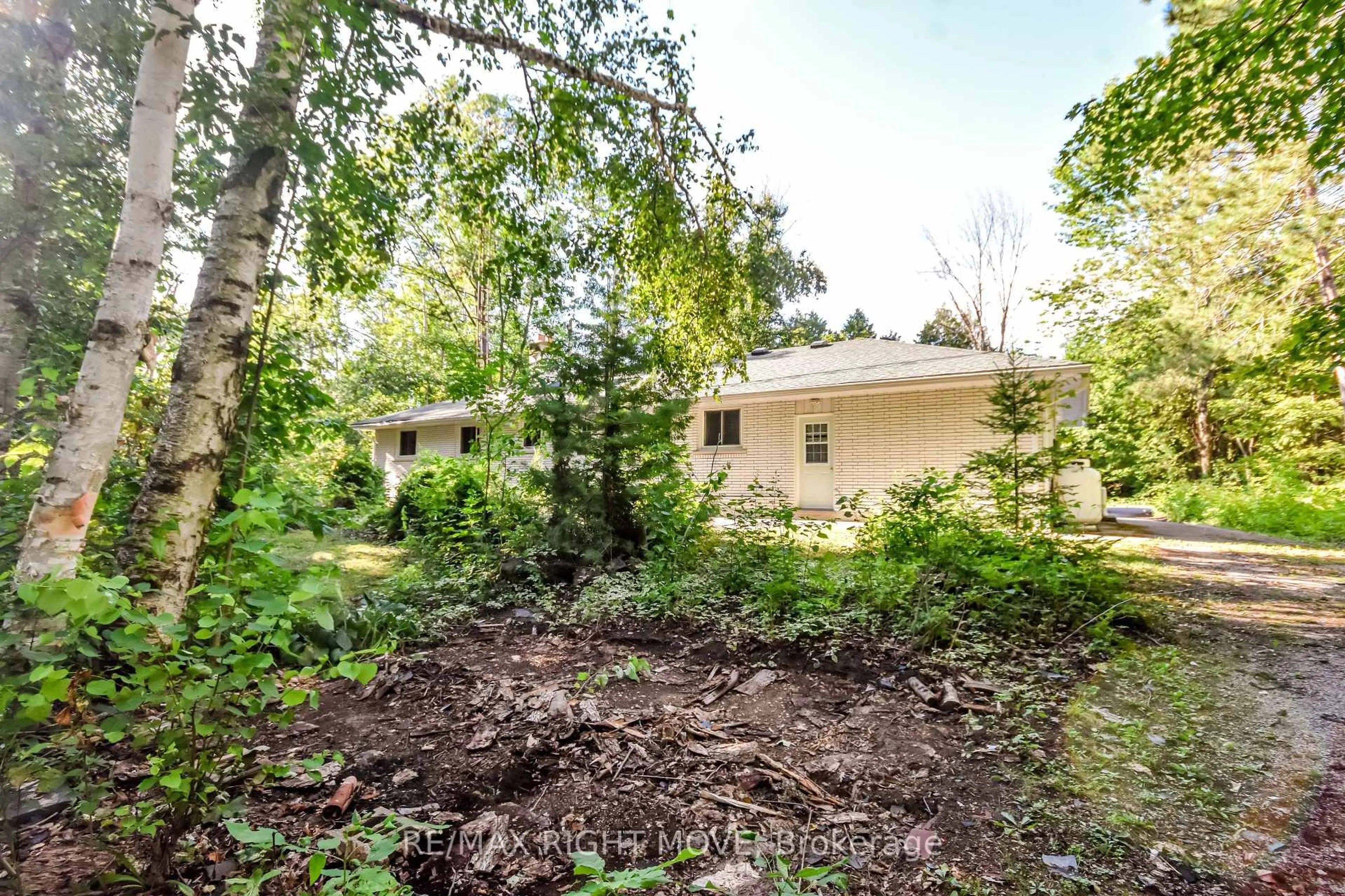 A pic from outside/outdoor area/front of a property/back of a property/a pic from drone, forest/trees view for 1781 Mt. St. Louis Rd, Oro-Medonte Ontario L0K 1E0