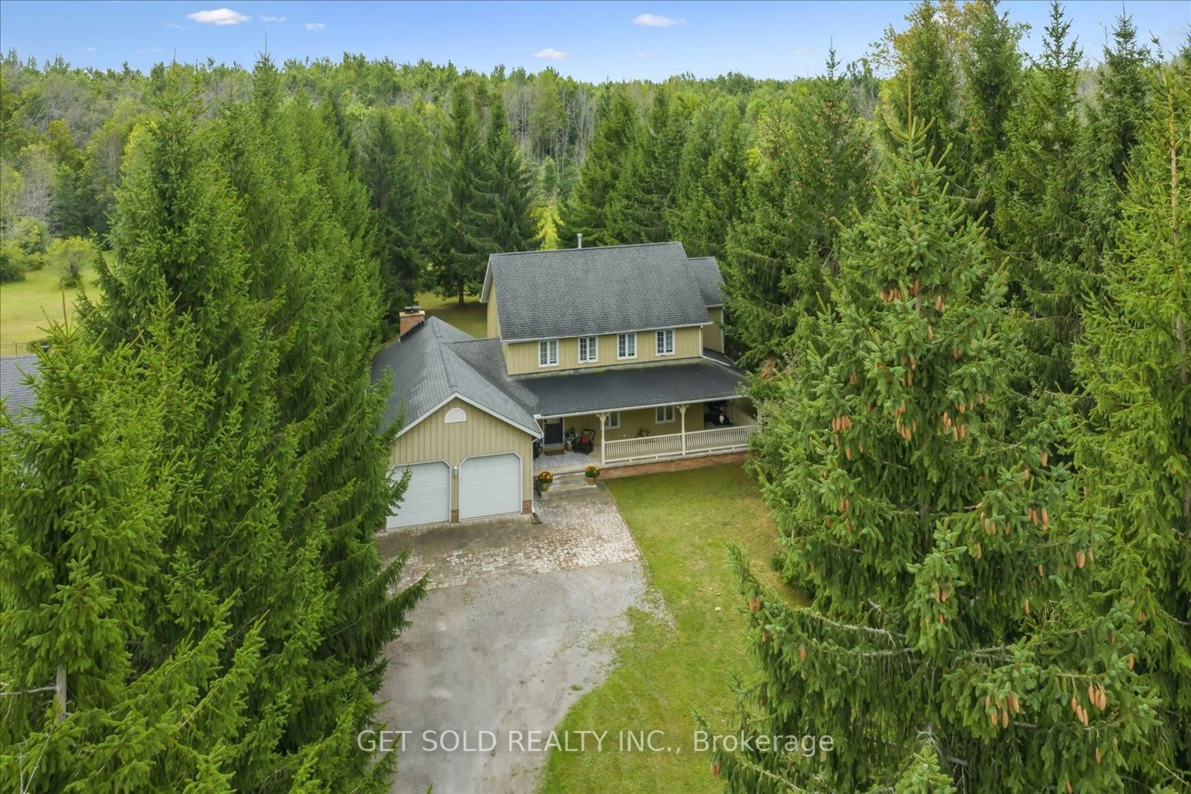 A pic from outside/outdoor area/front of a property/back of a property/a pic from drone, forest/trees view for 77 Simcoe Rd, Ramara Ontario L0K 1B0