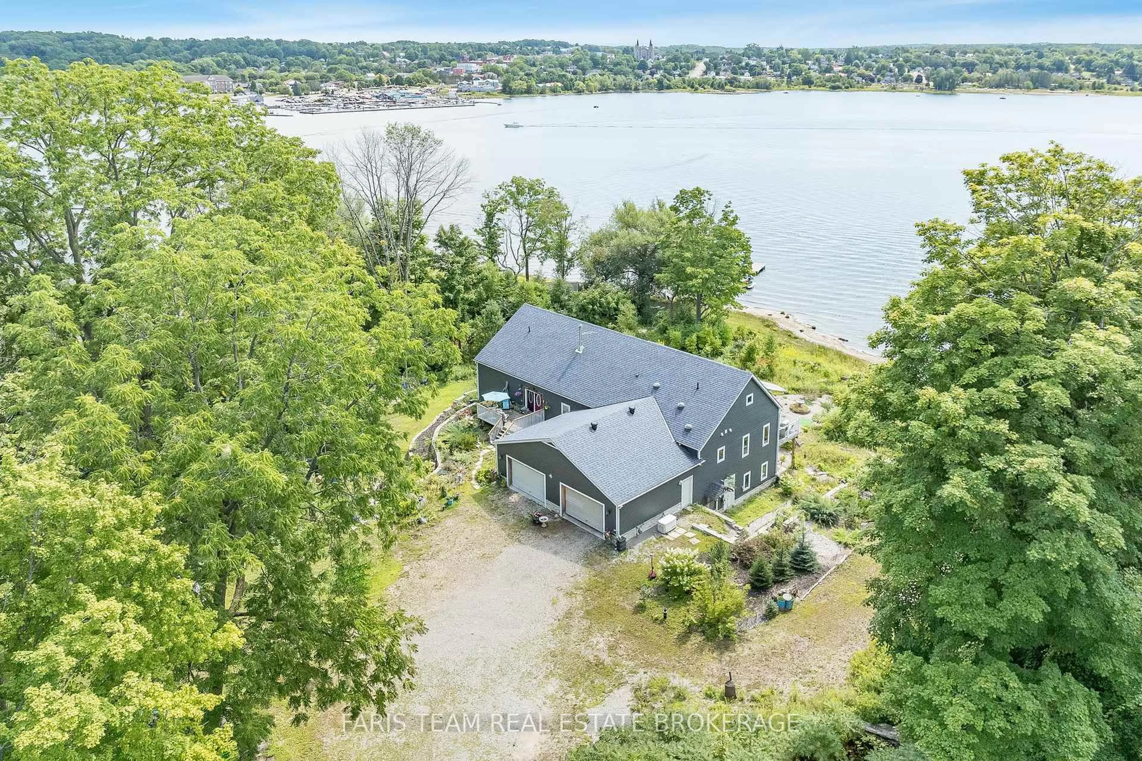 A pic from outside/outdoor area/front of a property/back of a property/a pic from drone, water/lake/river/ocean view for 243 Champlain Rd, Penetanguishene Ontario L9M 1S2