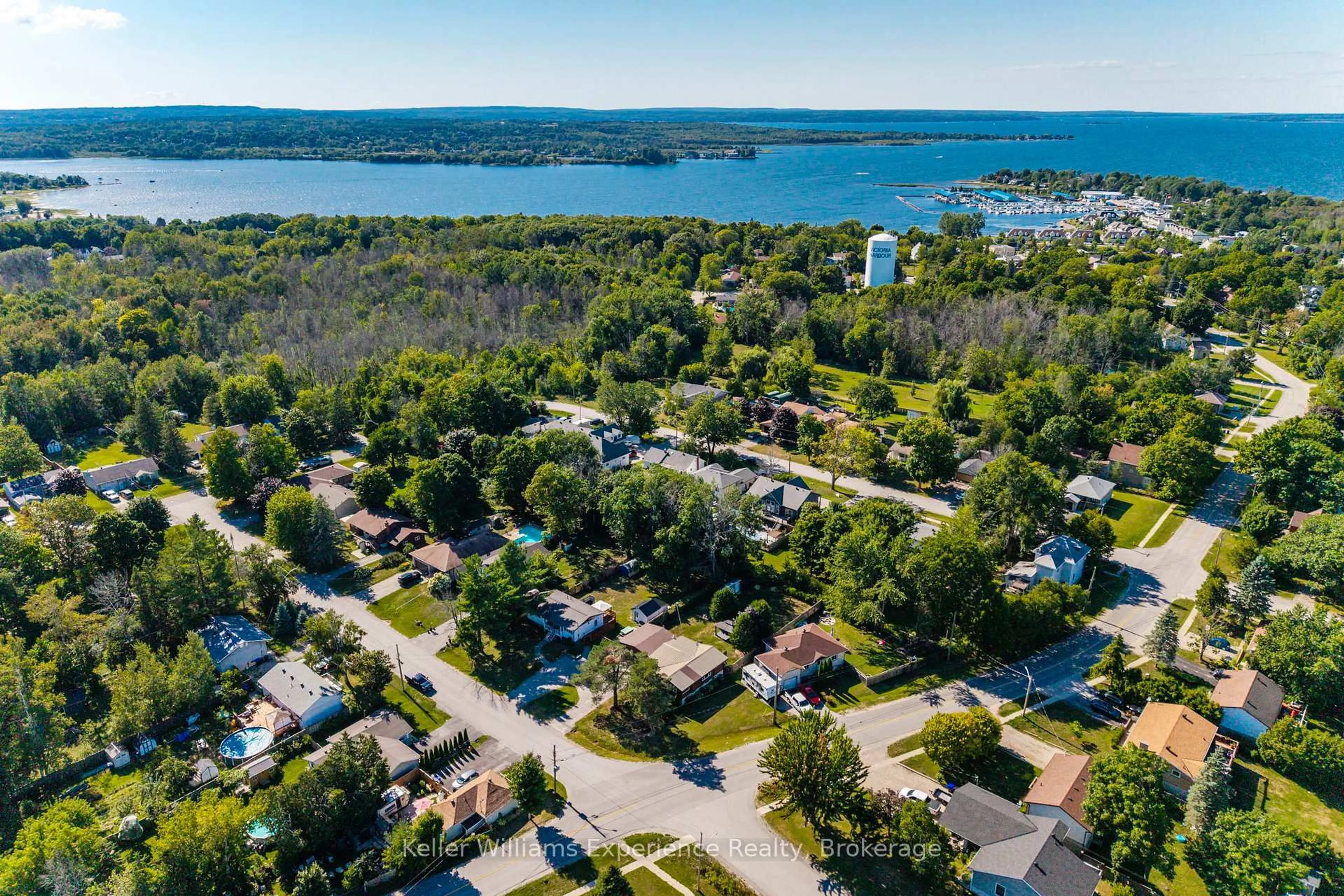 A pic from outside/outdoor area/front of a property/back of a property/a pic from drone, water/lake/river/ocean view for 144 Bay St, Tay Ontario L0K 2A0