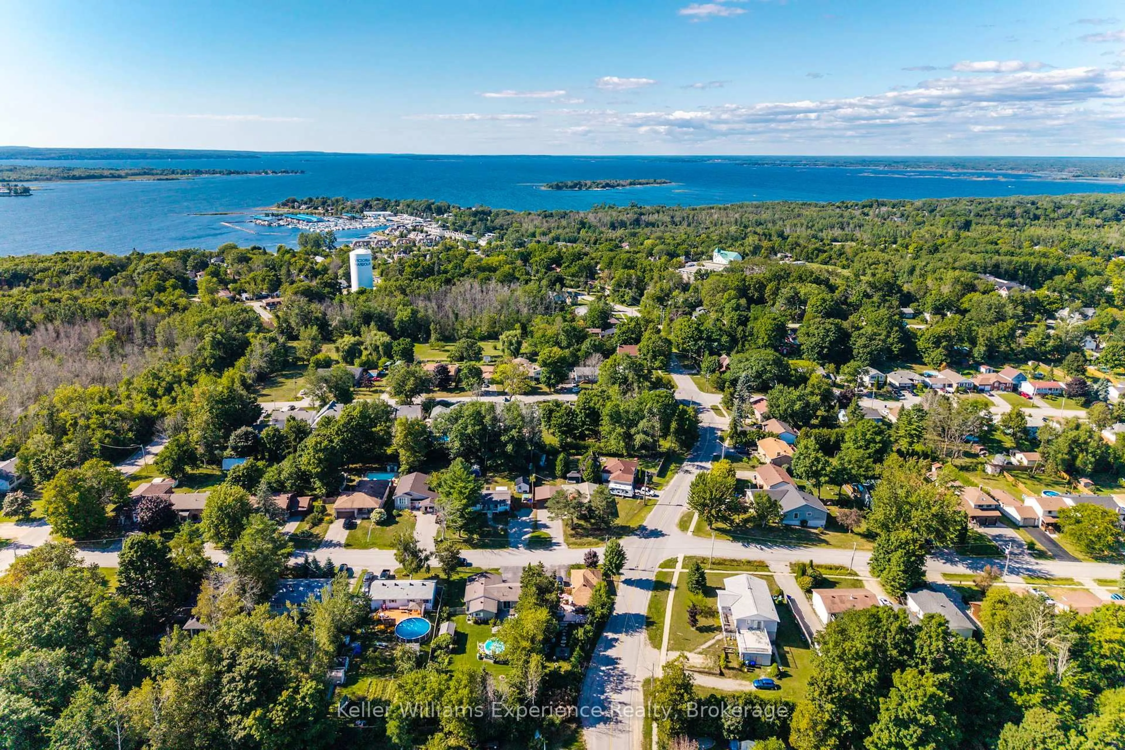 A pic from outside/outdoor area/front of a property/back of a property/a pic from drone, water/lake/river/ocean view for 144 Bay St, Tay Ontario L0K 2A0