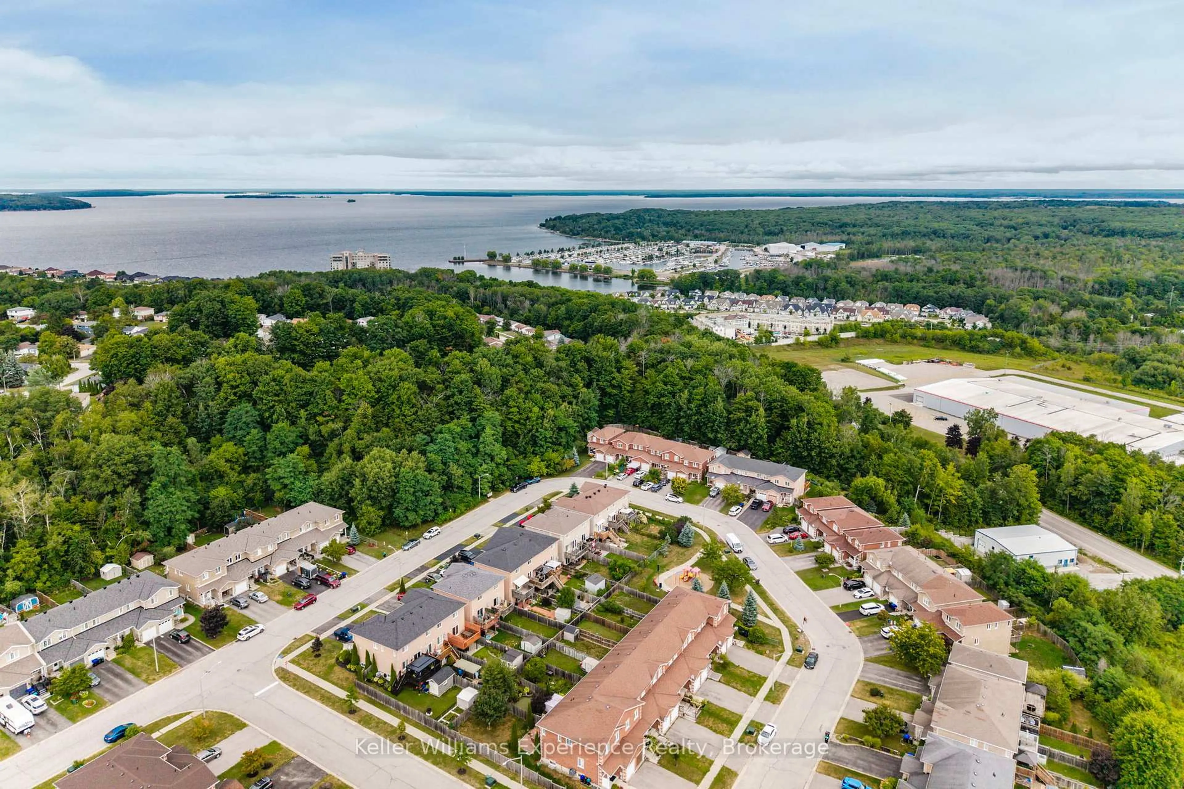 A pic from outside/outdoor area/front of a property/back of a property/a pic from drone, water/lake/river/ocean view for 167 Southwinds Cres, Midland Ontario L4R 0A2