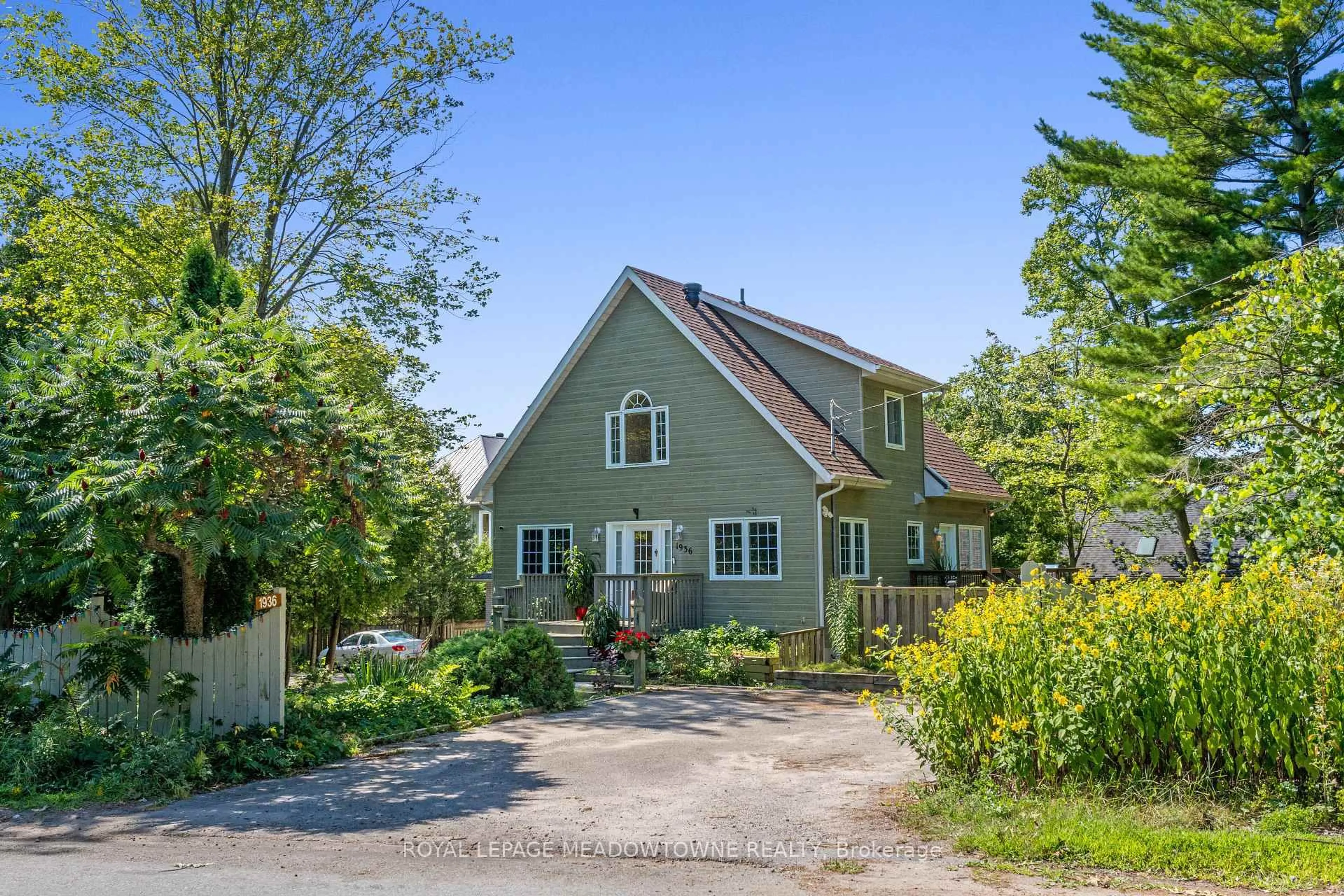 A pic from outside/outdoor area/front of a property/back of a property/a pic from drone, street for 1936 Tiny Beaches Rd, Tiny Ontario L0L 1P0