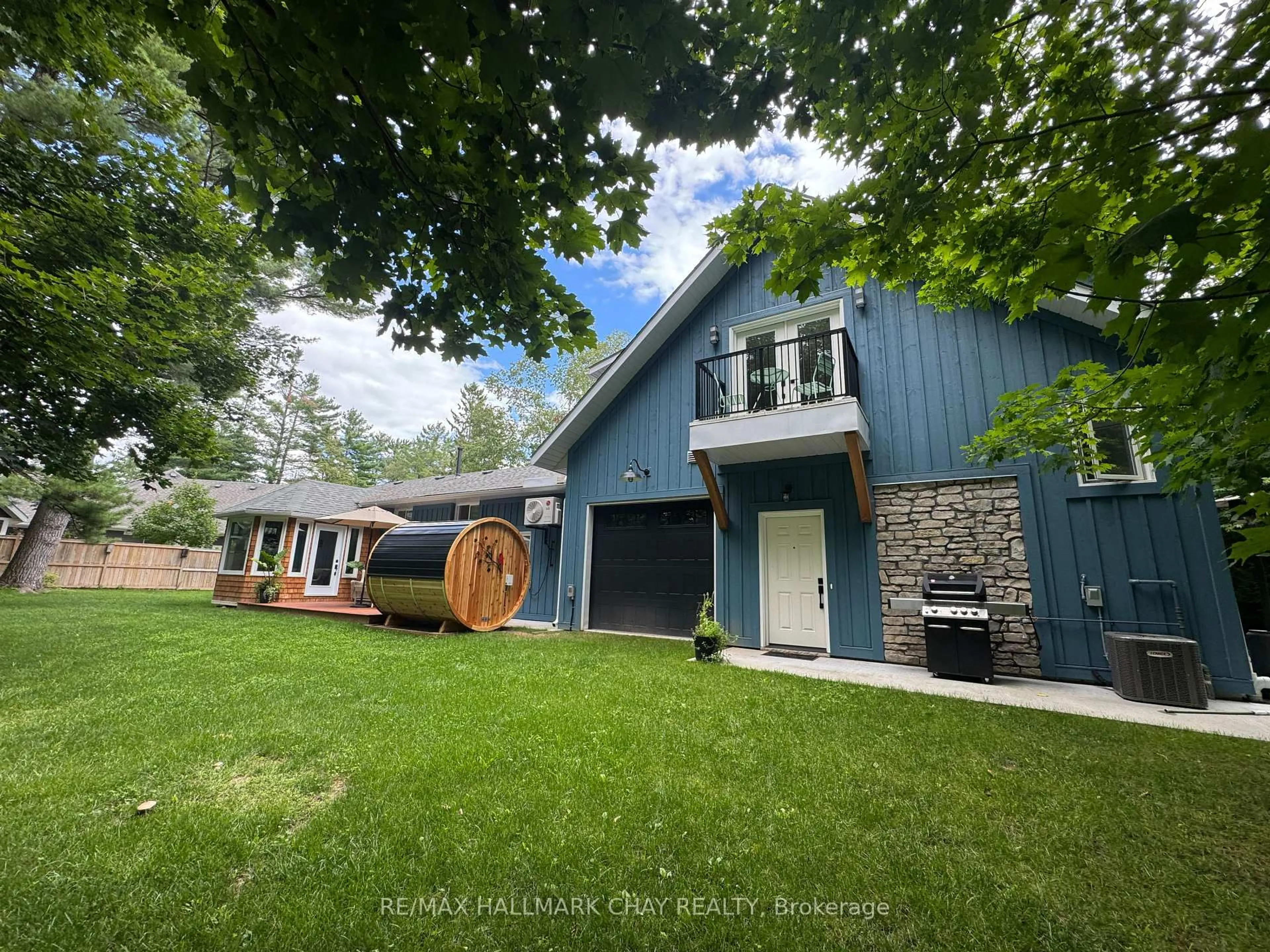 A pic from outside/outdoor area/front of a property/back of a property/a pic from drone, unknown for 18 Lawrence Ave, Springwater Ontario L9X 0W3