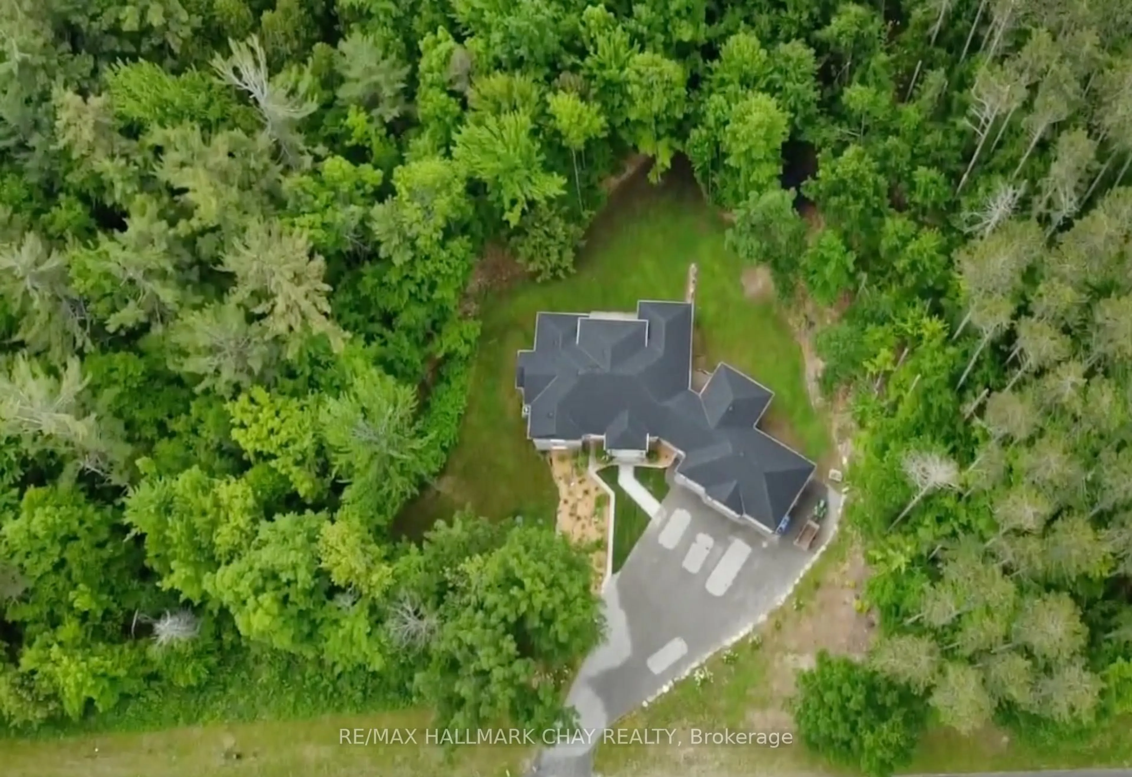 A pic from outside/outdoor area/front of a property/back of a property/a pic from drone, forest/trees view for 2 Timberland Crt, Tiny Ontario L9M 0M3