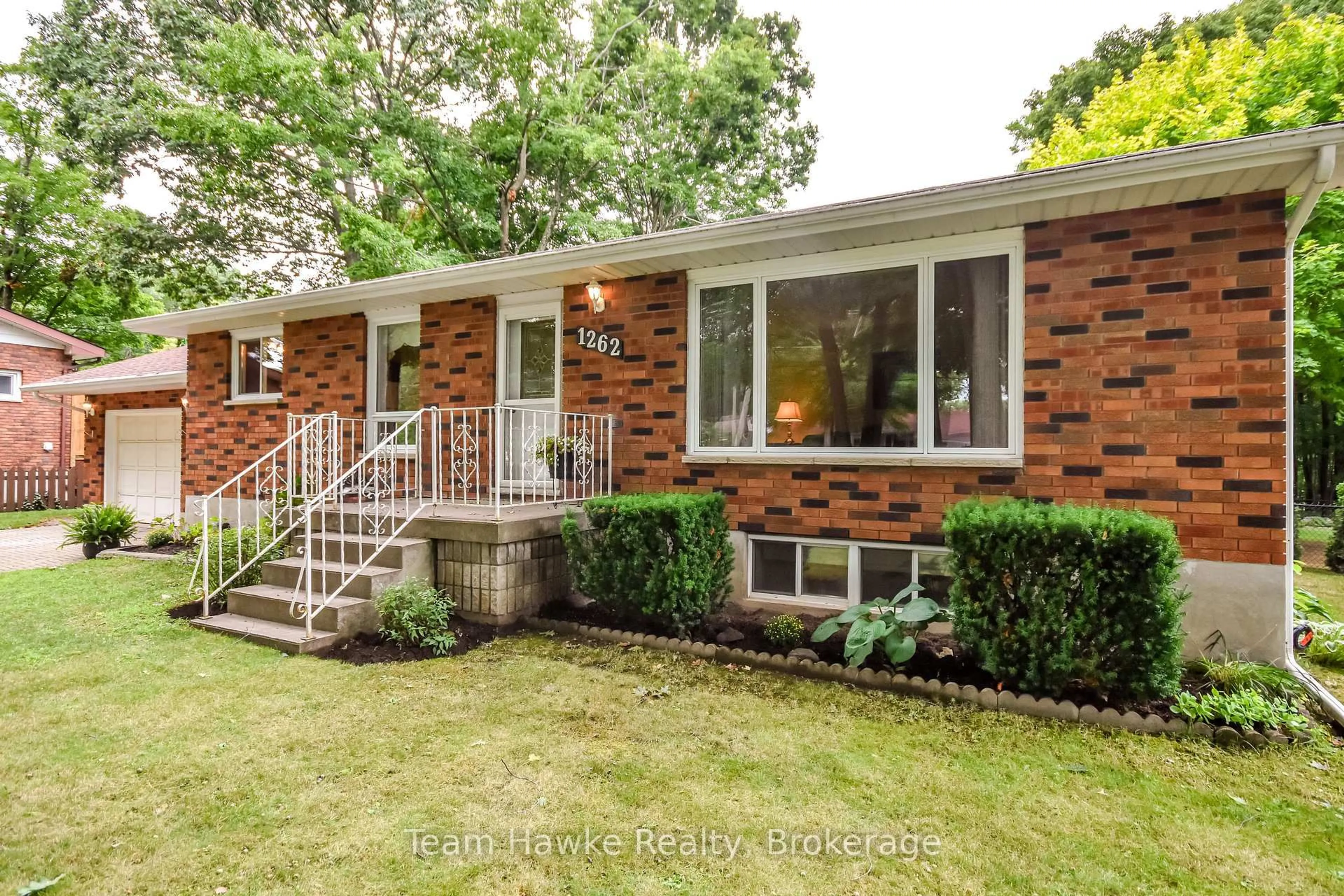 Home with brick exterior material, street for 1262 Everton Rd, Midland Ontario L4R 5J5