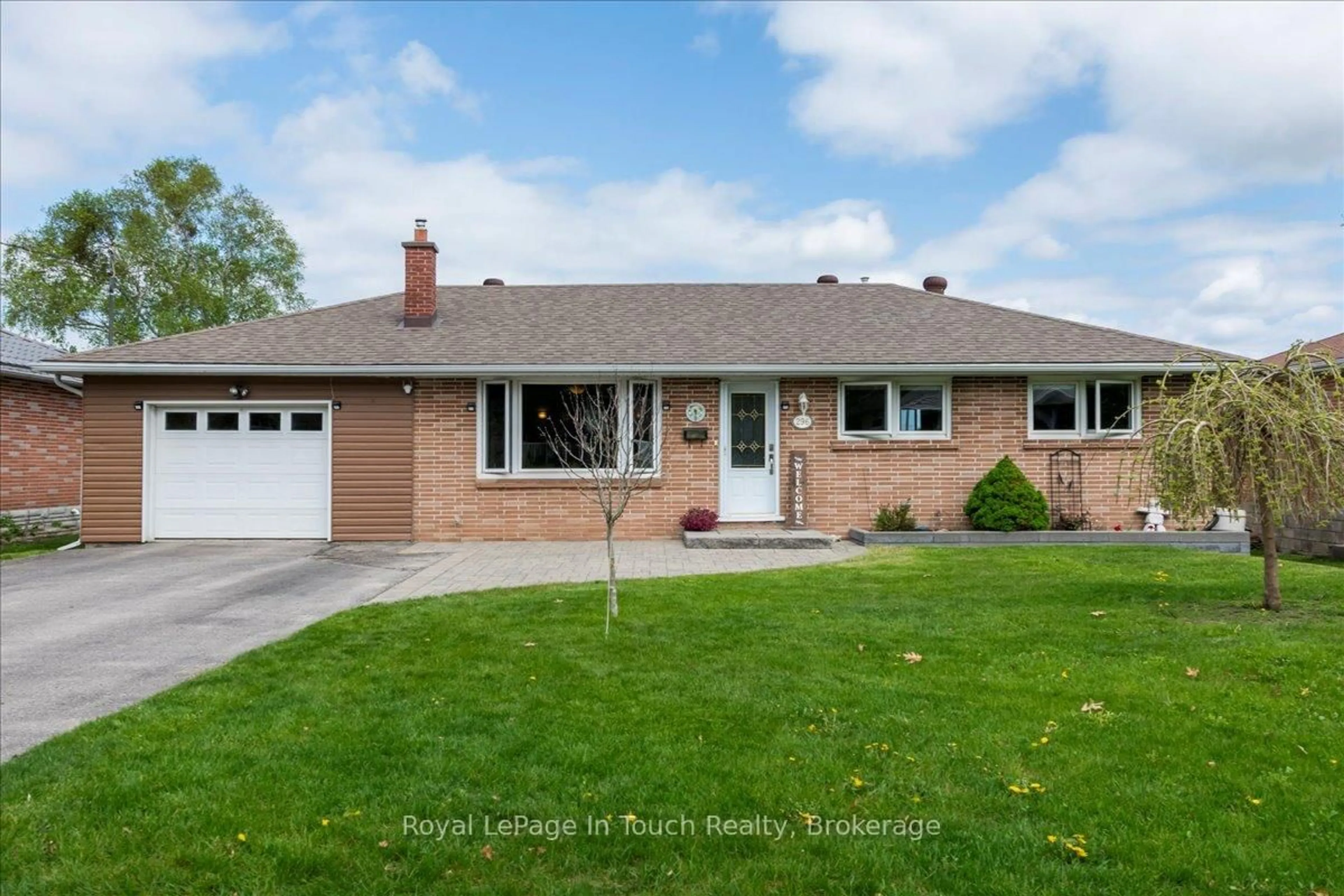 Home with brick exterior material, street for 296 John St, Midland Ontario L4R 2J5