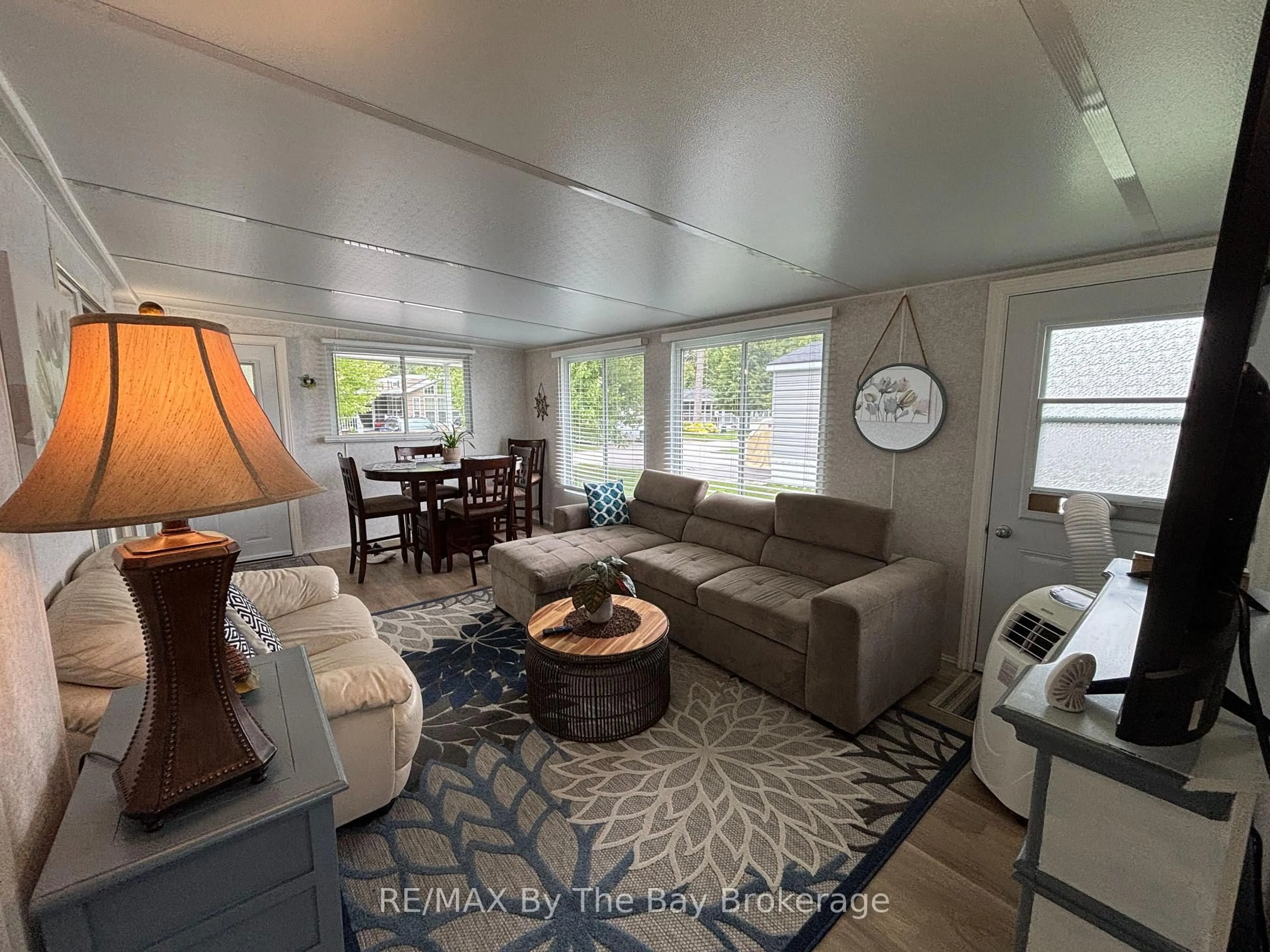 Living room with furniture, unknown for 108 Madawaska Tr, Wasaga Beach Ontario L9Z 1X7