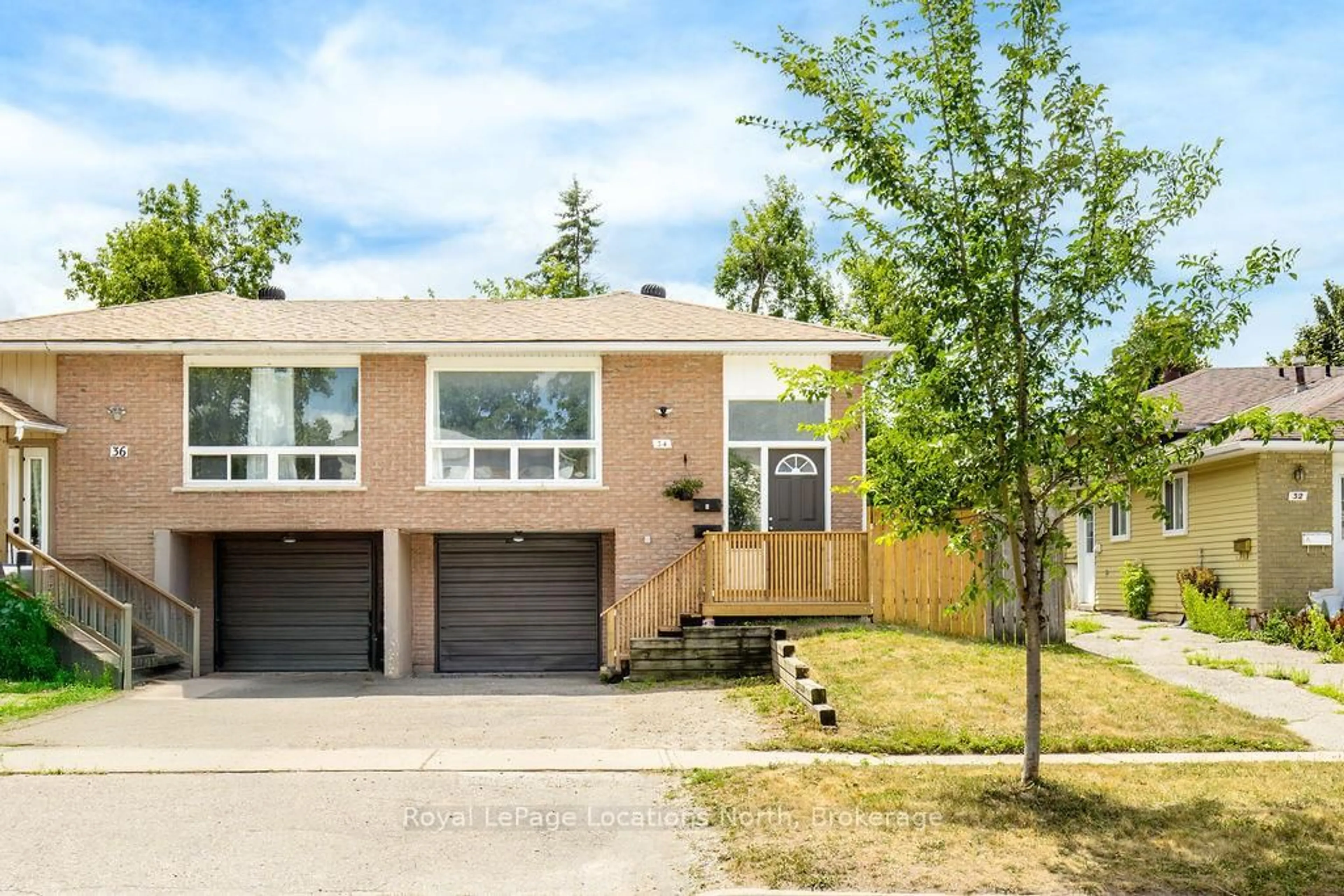 Home with brick exterior material, street for 34 CARLTON Rd, Barrie Ontario L4M 5J6