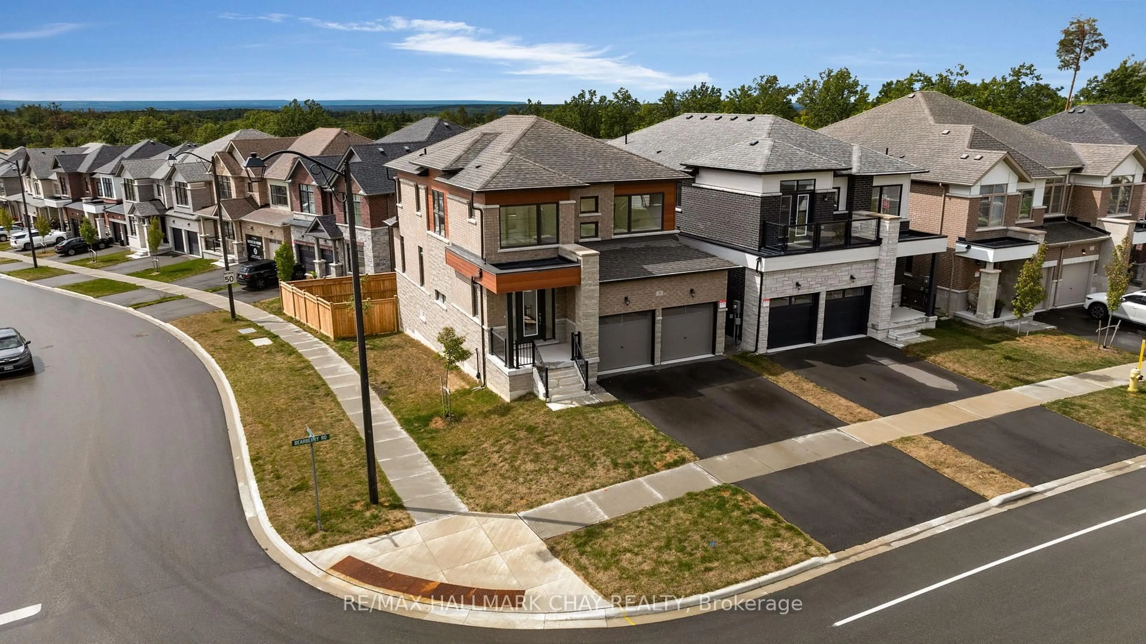 A pic from outside/outdoor area/front of a property/back of a property/a pic from drone, street for 58 Bearberry Rd, Springwater Ontario L9X 2E1
