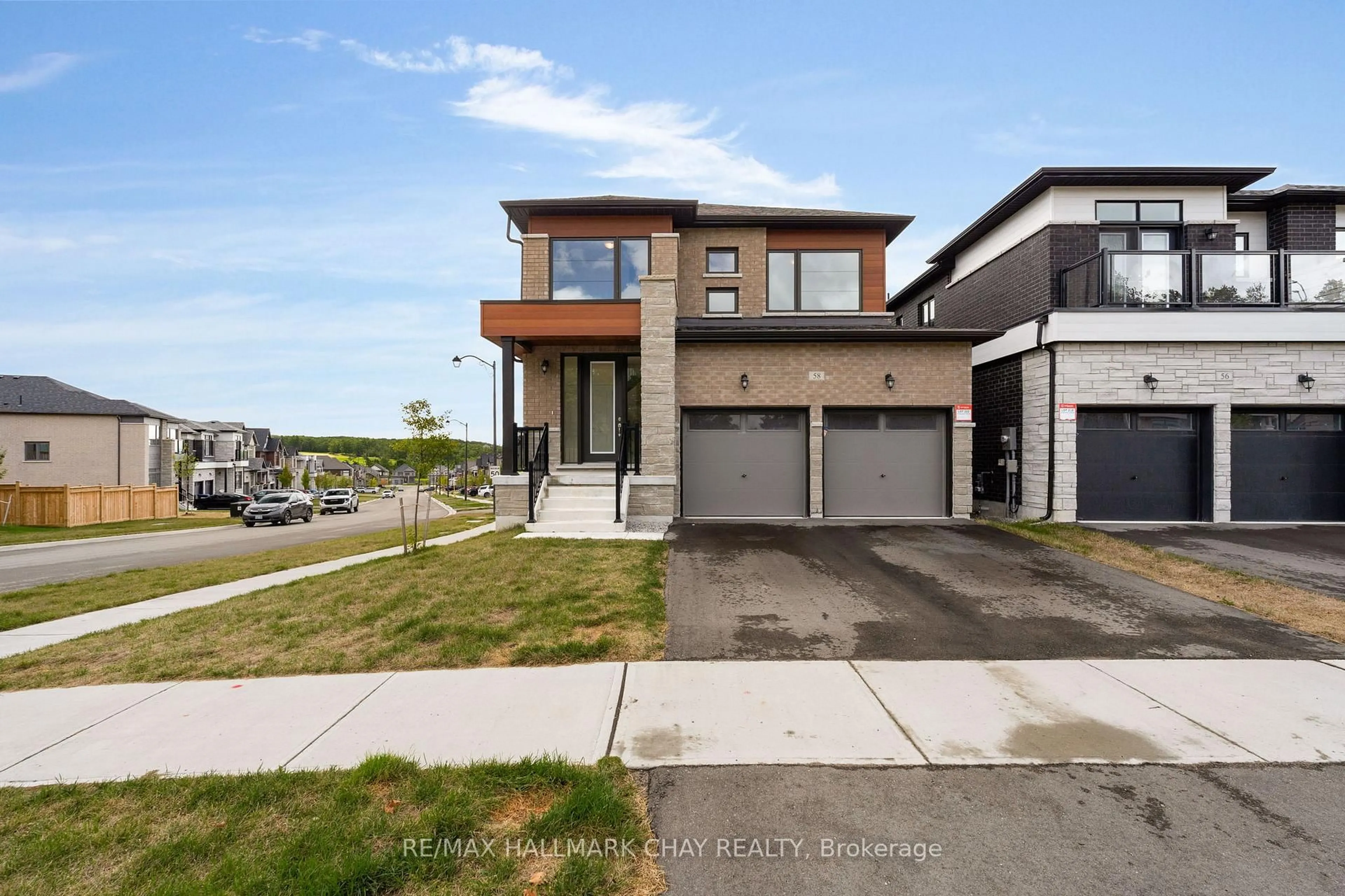 Home with brick exterior material, street for 58 Bearberry Rd, Springwater Ontario L9X 2E1