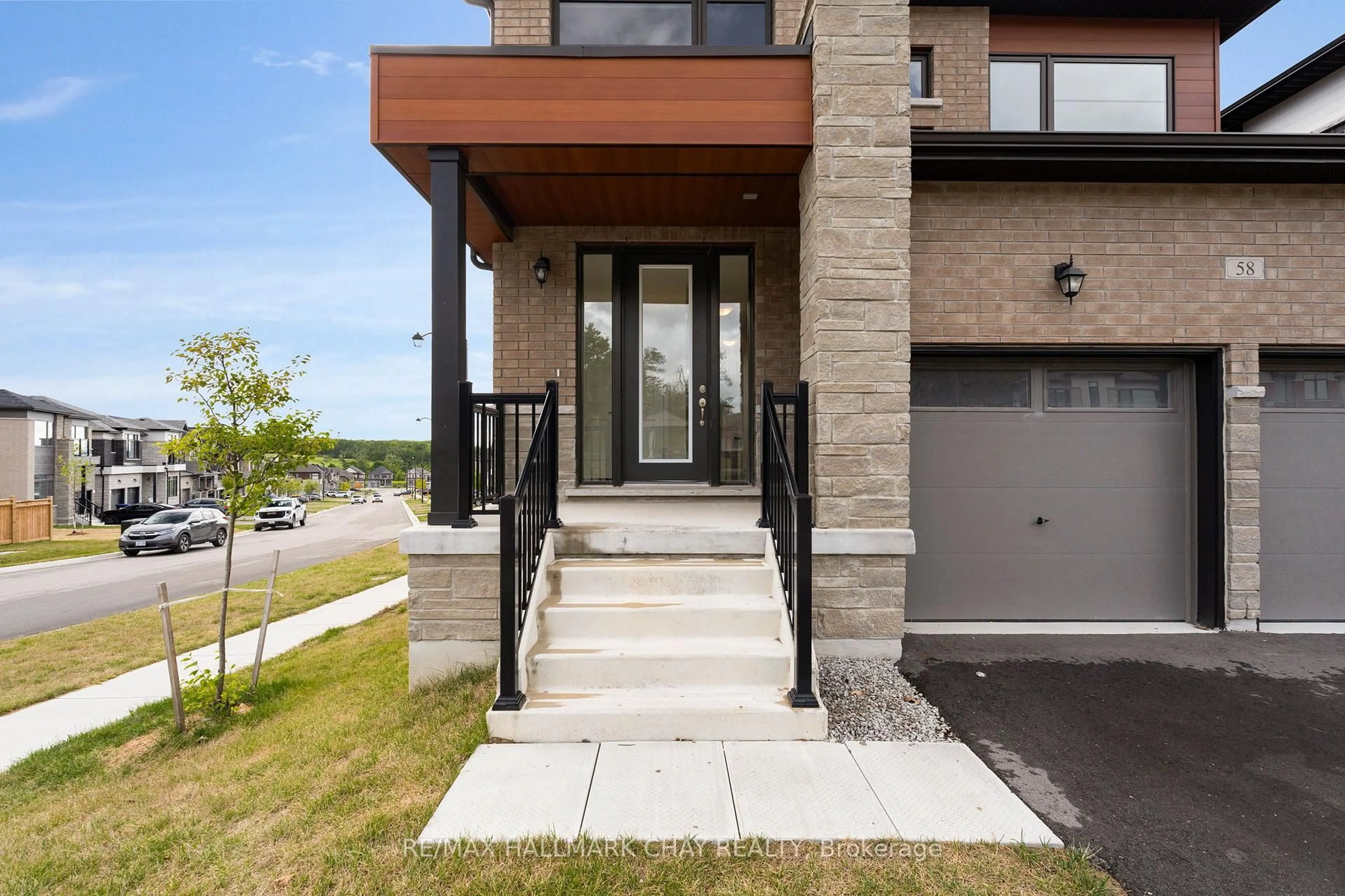 Home with brick exterior material, street for 58 Bearberry Rd, Springwater Ontario L9X 2E1