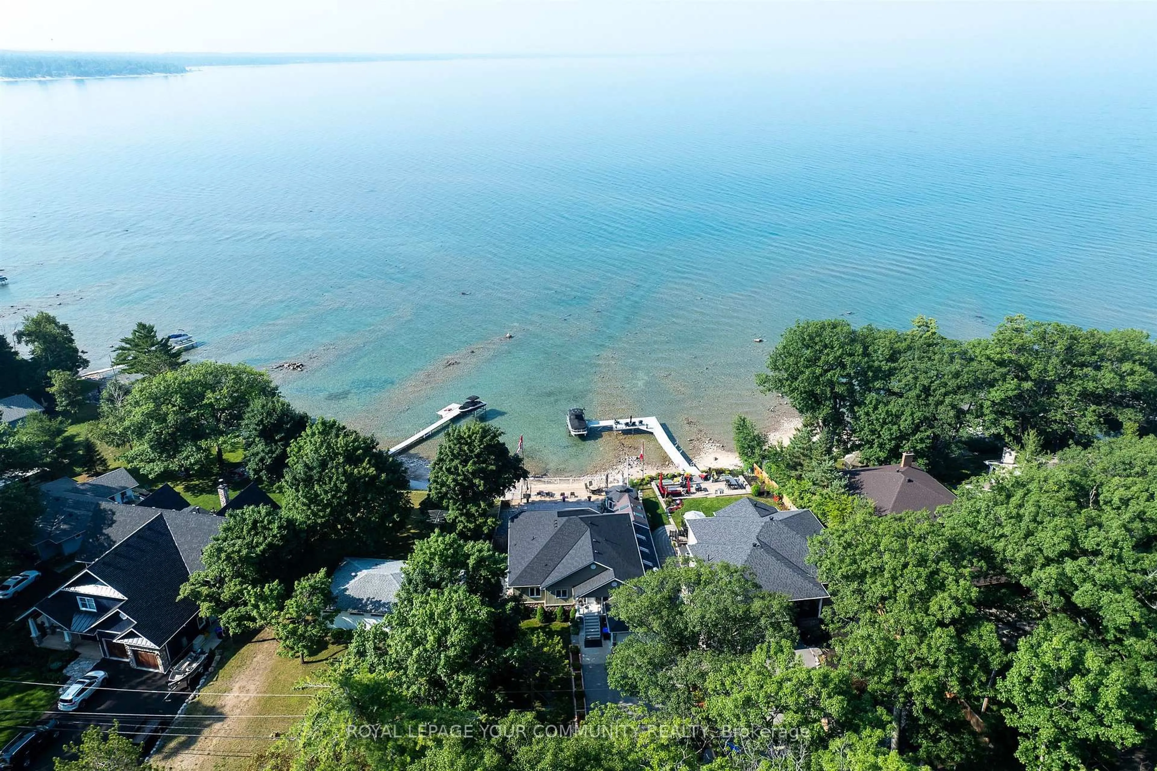 A pic from outside/outdoor area/front of a property/back of a property/a pic from drone, water/lake/river/ocean view for 1834 Tiny Beaches Rd, Tiny Ontario L0L 1P1