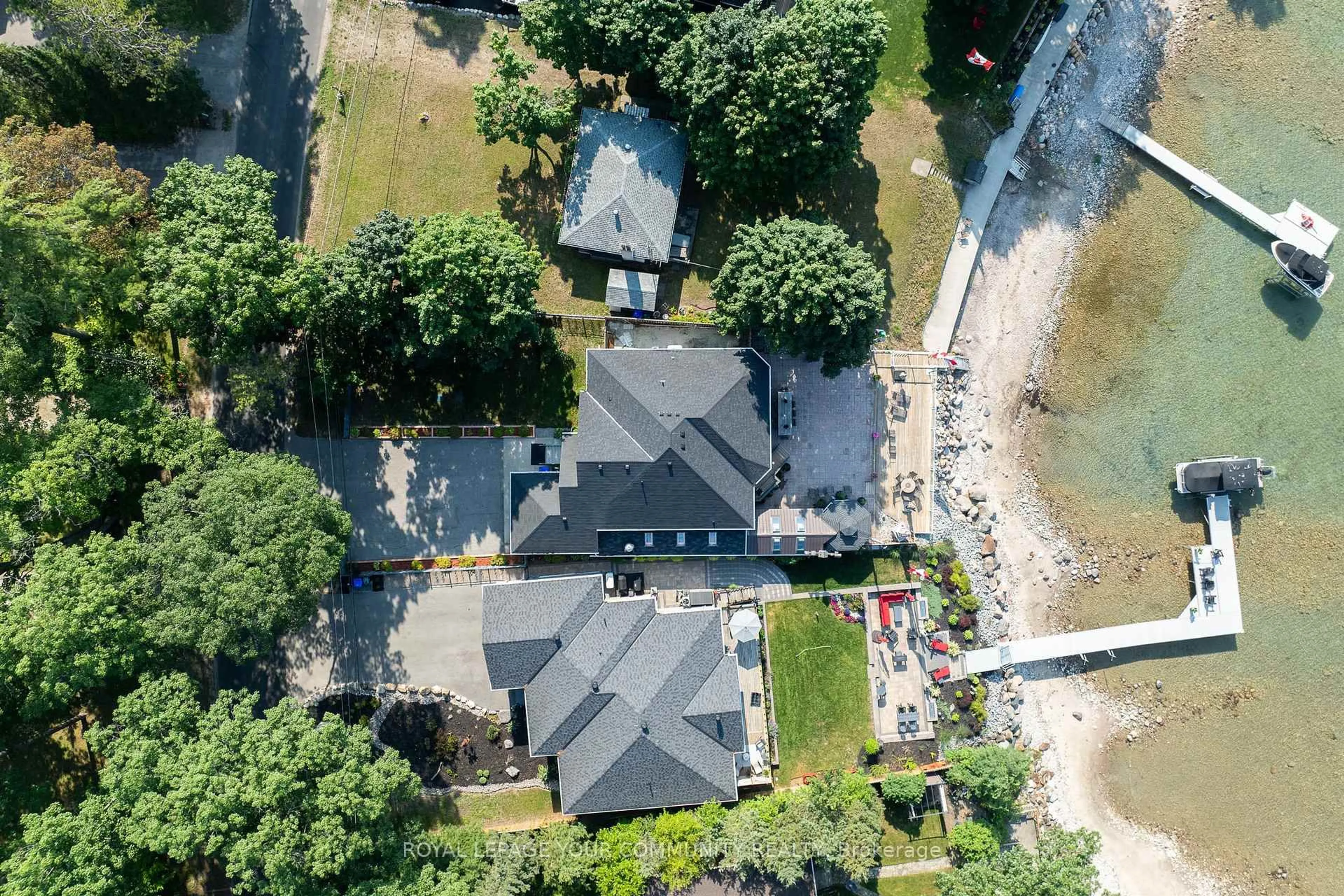 A pic from outside/outdoor area/front of a property/back of a property/a pic from drone, street for 1834 Tiny Beaches Rd, Tiny Ontario L0L 1P1