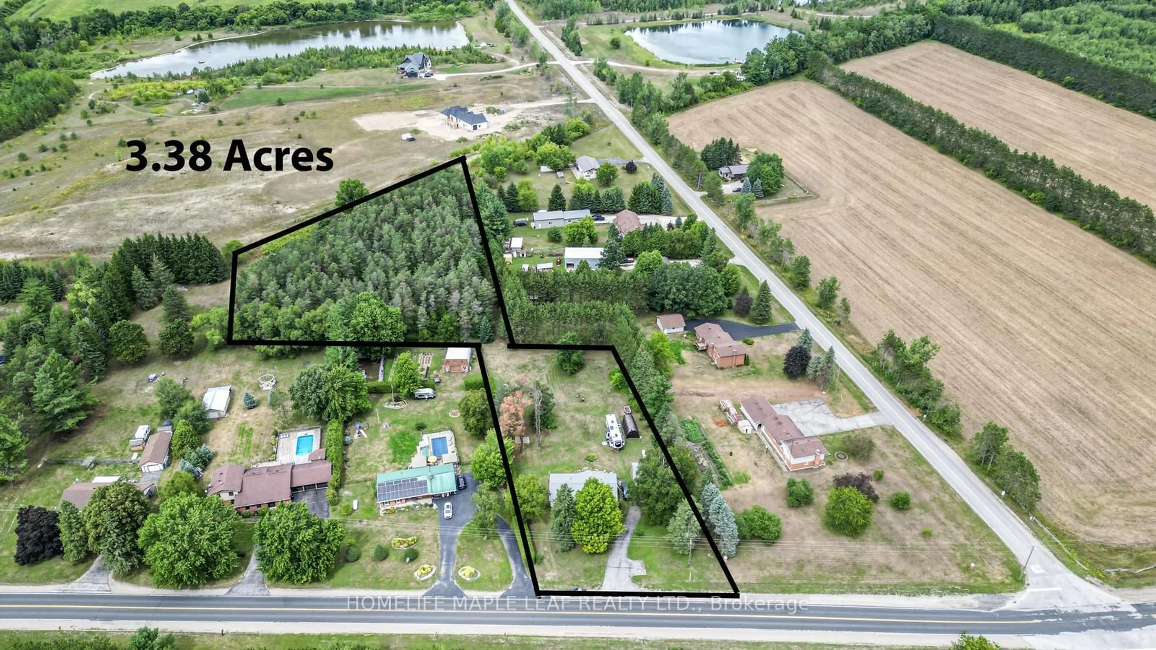 A pic from outside/outdoor area/front of a property/back of a property/a pic from drone, street for 6168 County Road 9, Clearview Ontario L0M 1N0