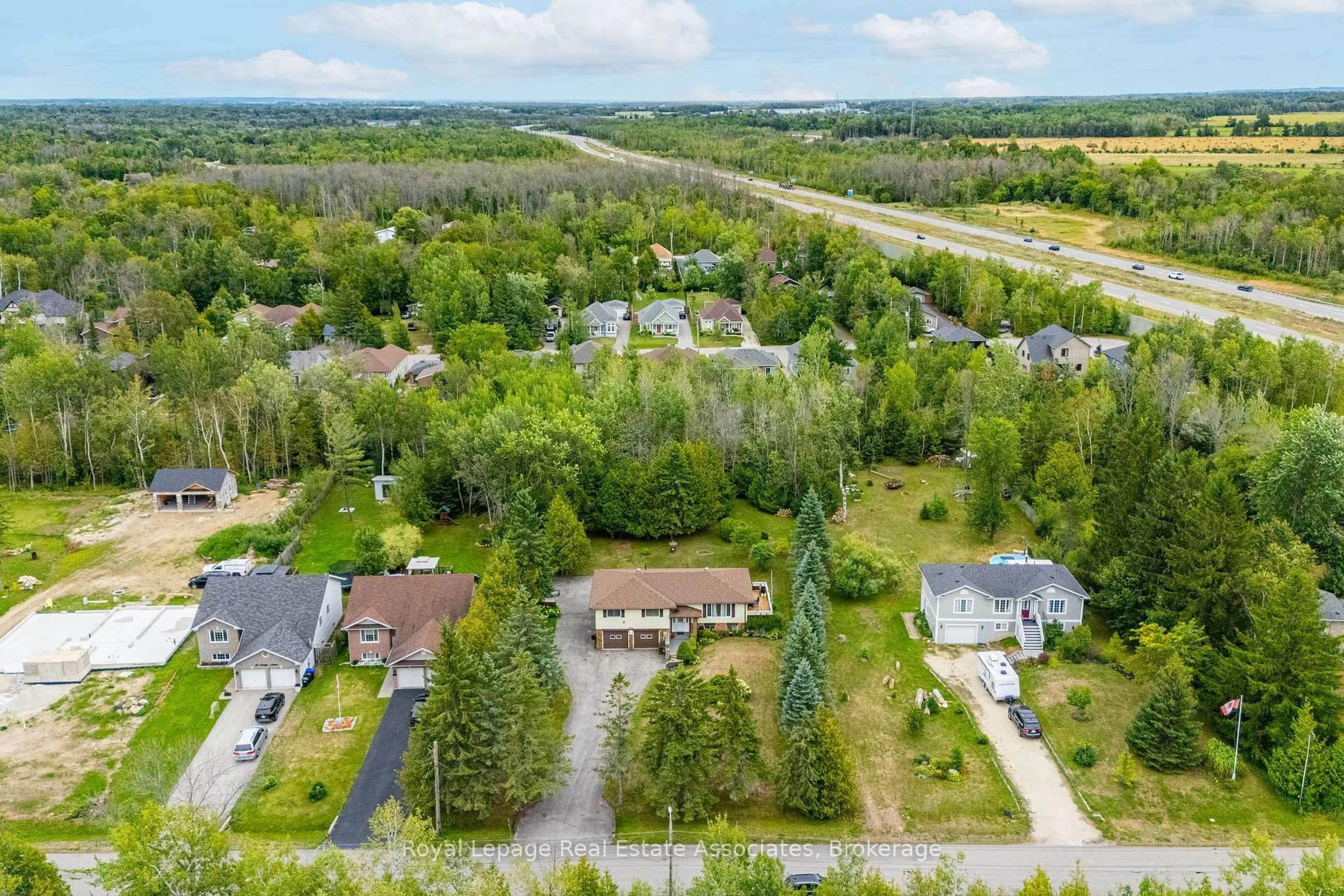 A pic from outside/outdoor area/front of a property/back of a property/a pic from drone, forest/trees view for 69 George Ave, Wasaga Beach Ontario L9Z 2X9