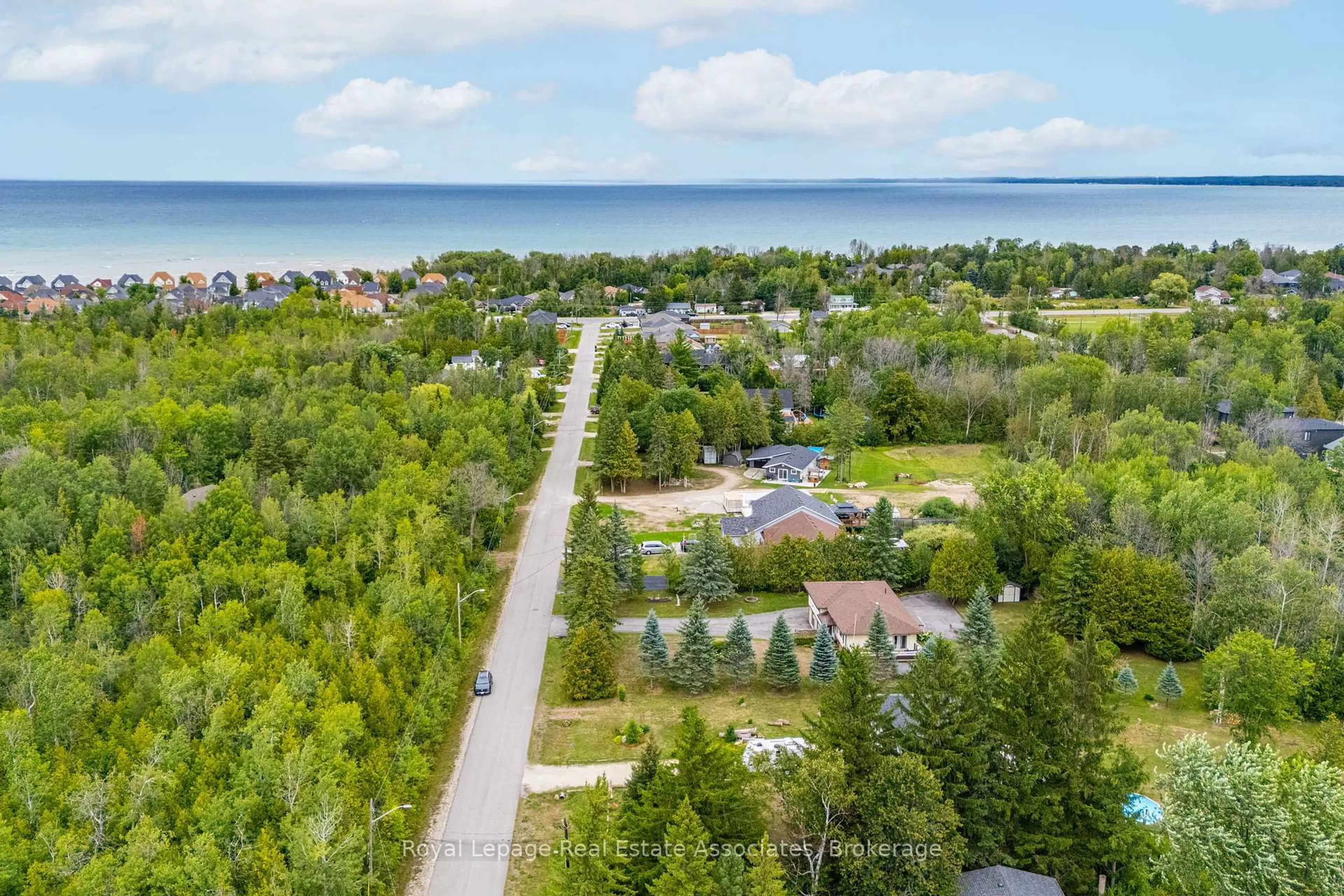 A pic from outside/outdoor area/front of a property/back of a property/a pic from drone, water/lake/river/ocean view for 69 George Ave, Wasaga Beach Ontario L9Z 2X9