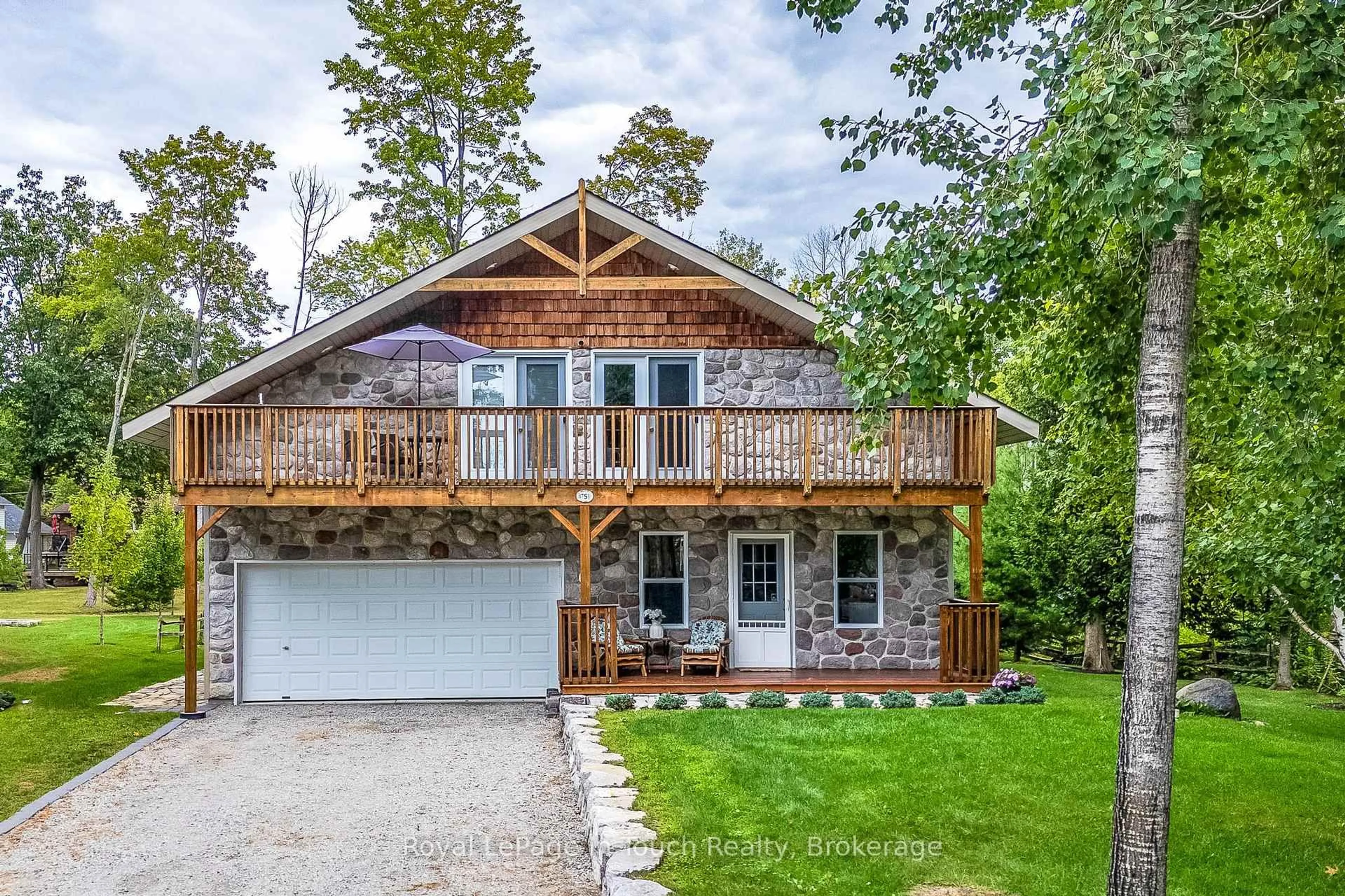 Home with brick exterior material, water/lake/river/ocean view for 1751 Tiny Beaches Rd, Tiny Ontario L0L 1P1