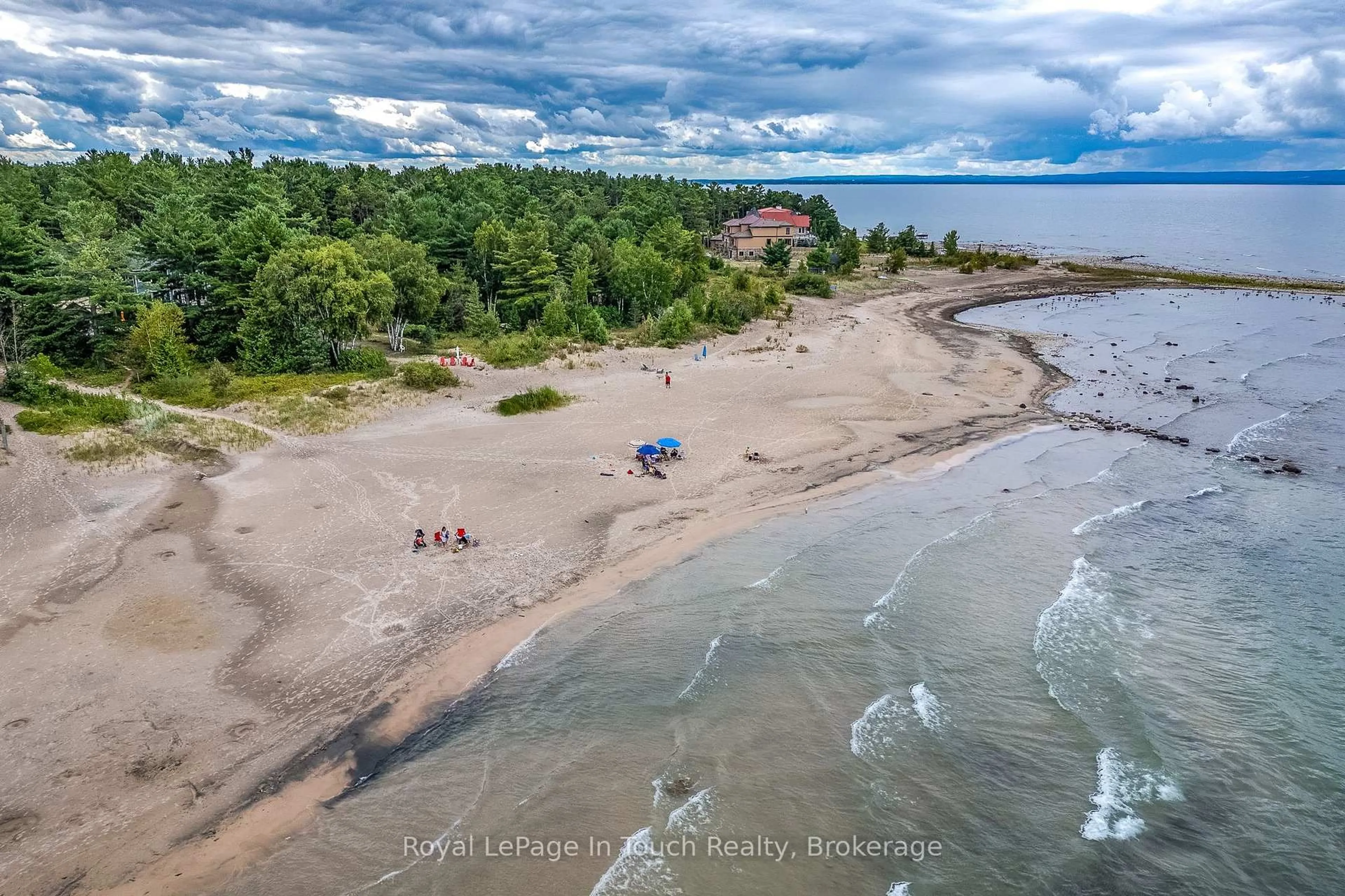 A pic from outside/outdoor area/front of a property/back of a property/a pic from drone, water/lake/river/ocean view for 1751 Tiny Beaches Rd, Tiny Ontario L0L 1P1