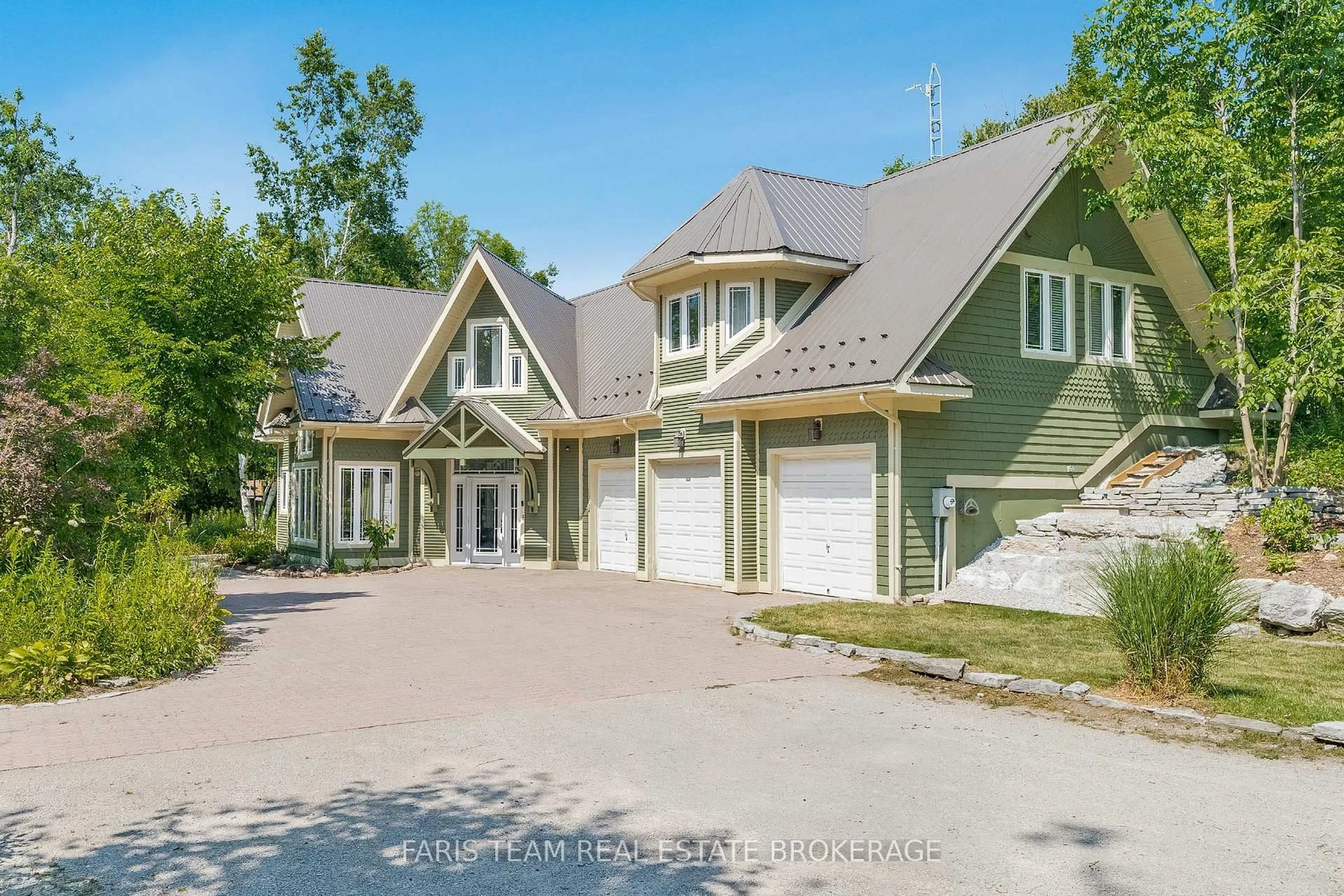 A pic from outside/outdoor area/front of a property/back of a property/a pic from drone, street for 2 Forest Wood Lane, Oro-Medonte Ontario L0L 1T0