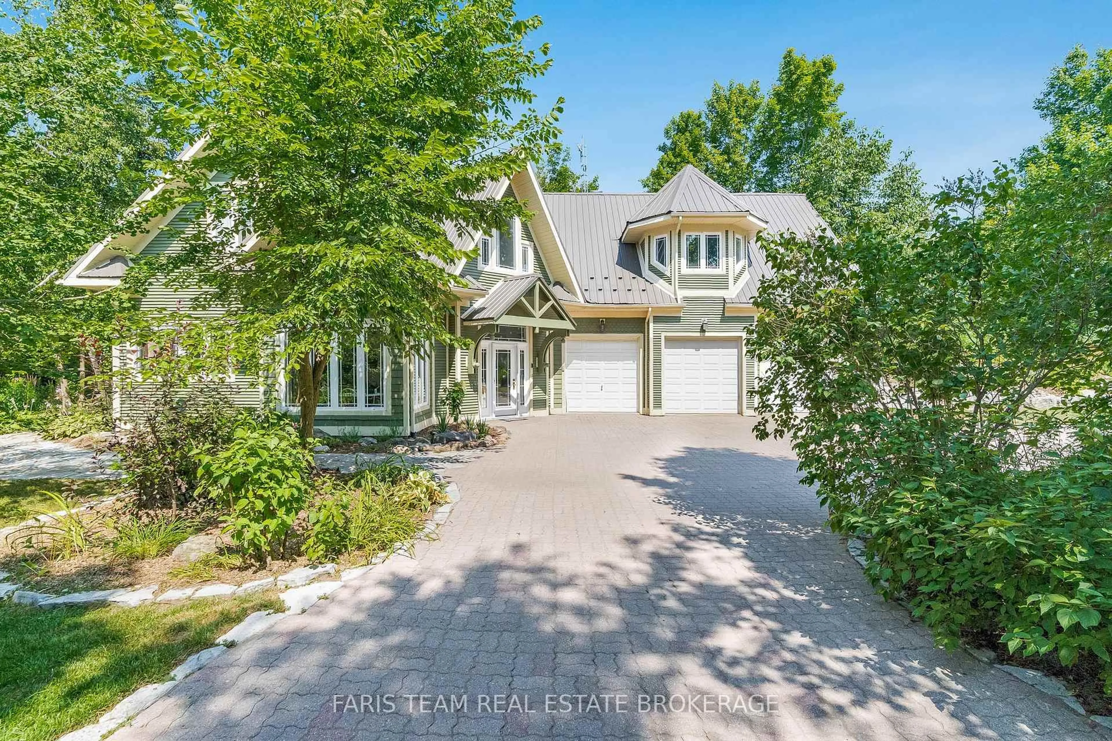A pic from outside/outdoor area/front of a property/back of a property/a pic from drone, street for 2 Forest Wood Lane, Oro-Medonte Ontario L0L 1T0