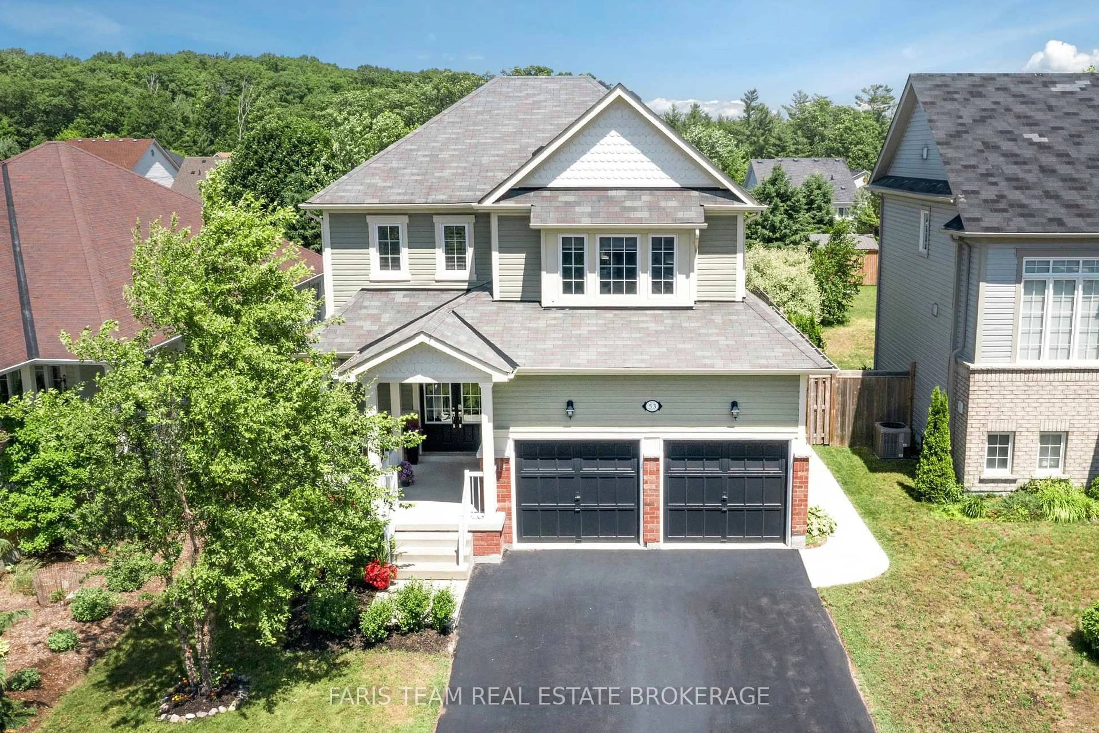 A pic from outside/outdoor area/front of a property/back of a property/a pic from drone, street for 53 Christy Dr, Wasaga Beach Ontario L9Z 0E5