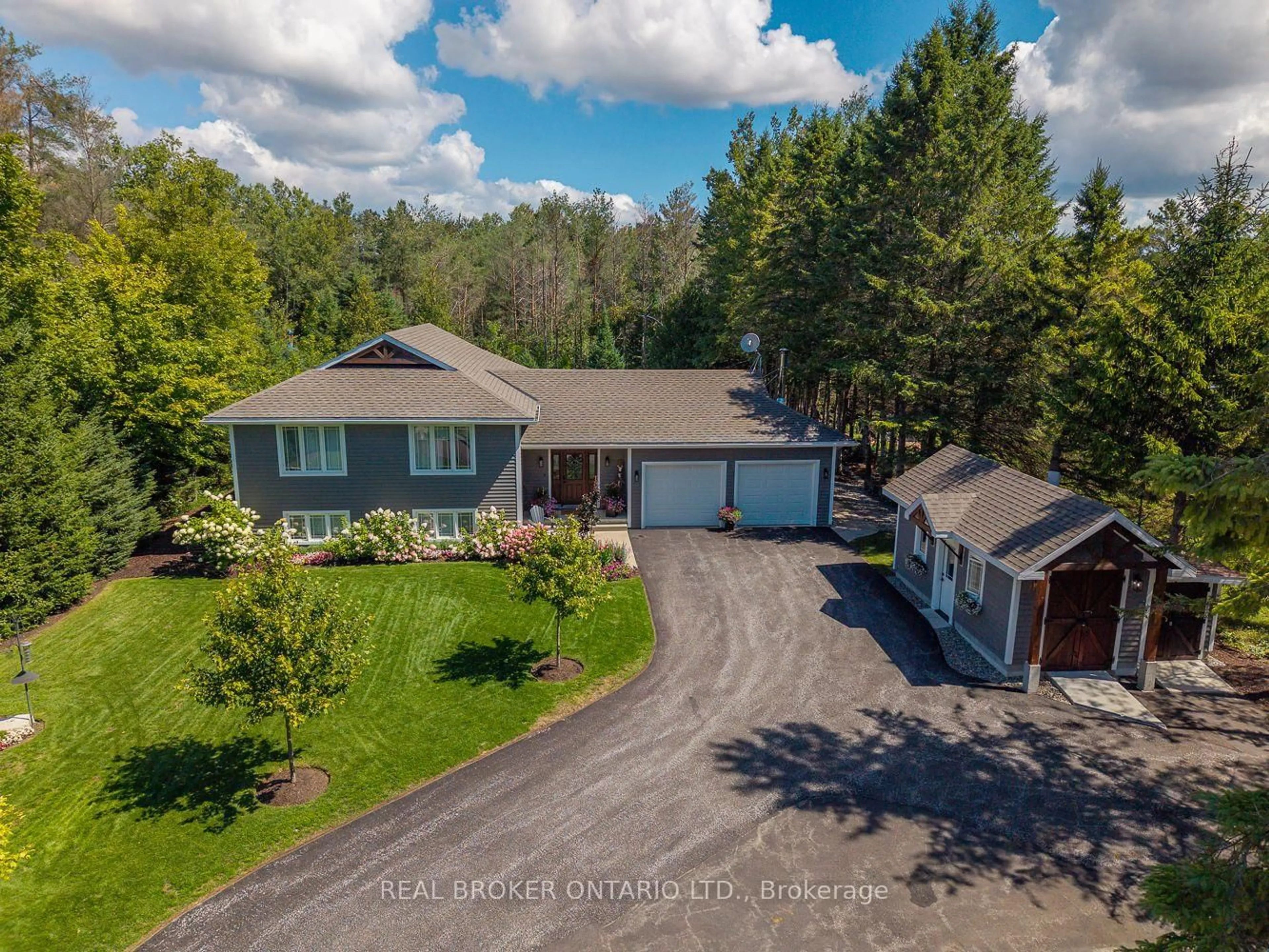 A pic from outside/outdoor area/front of a property/back of a property/a pic from drone, unknown for 8 Crystalwood Lane, Springwater Ontario L0L 1X0
