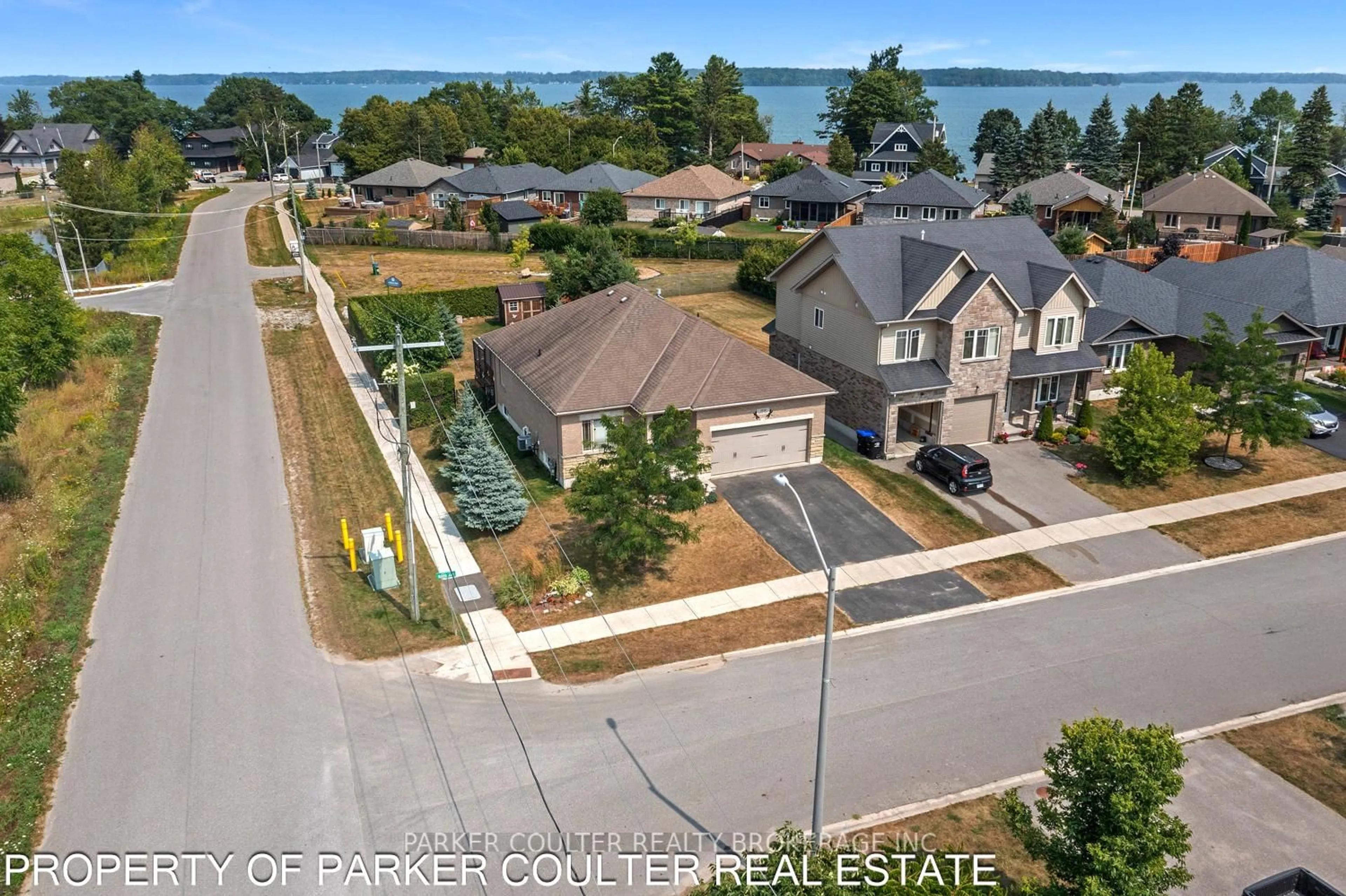 A pic from outside/outdoor area/front of a property/back of a property/a pic from drone, water/lake/river/ocean view for 3938 Wood Ave, Severn Ontario L3V 0Y9