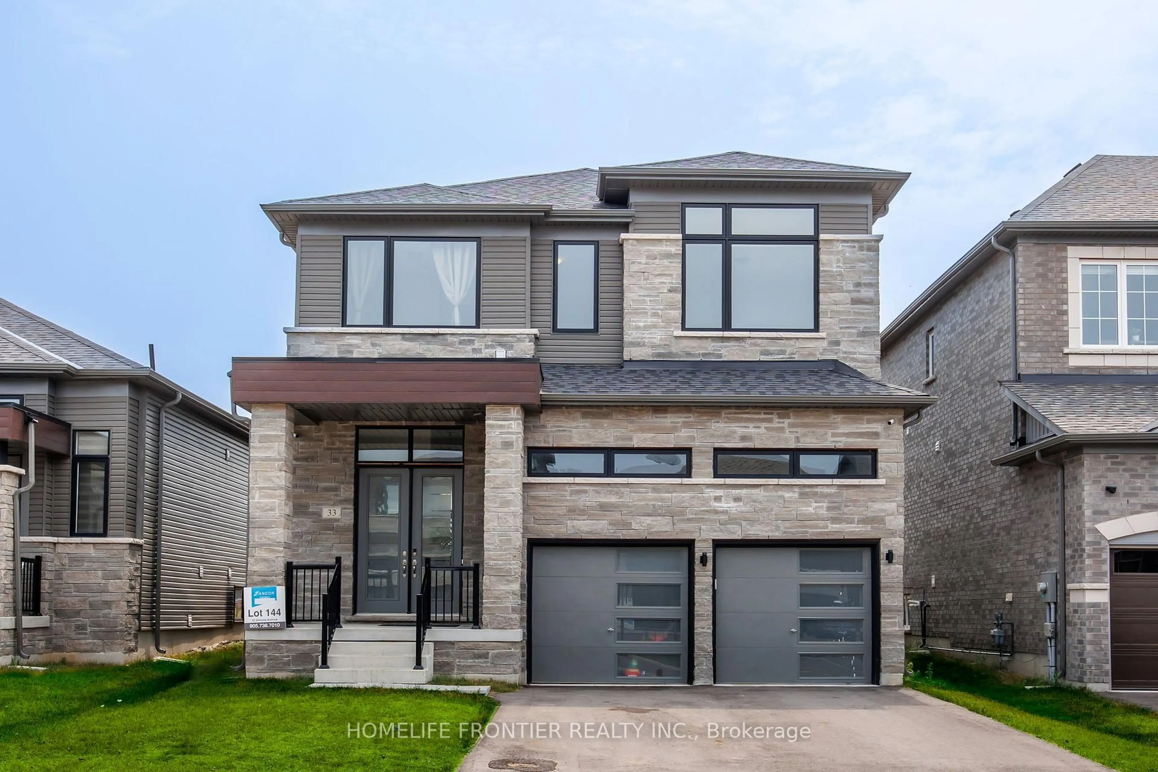 Home with brick exterior material, street for 33 Simona Ave, Wasaga Beach Ontario L9Z 0L5