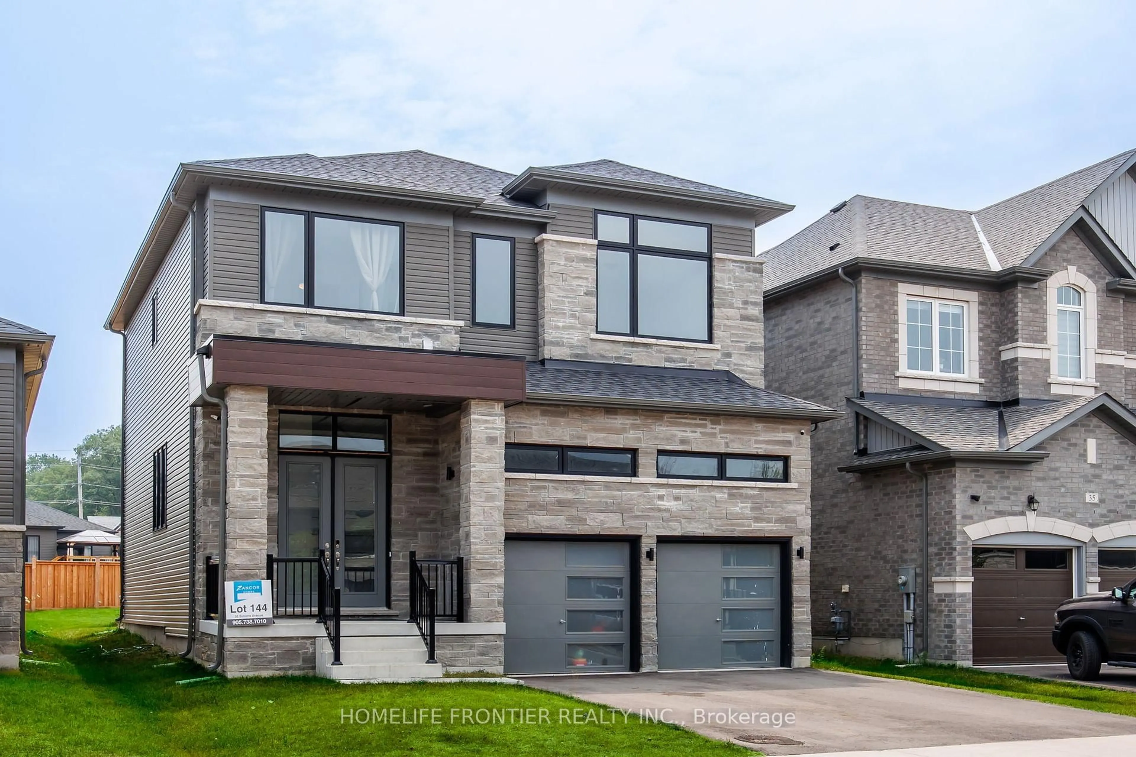 Home with brick exterior material, street for 33 Simona Ave, Wasaga Beach Ontario L9Z 0L5