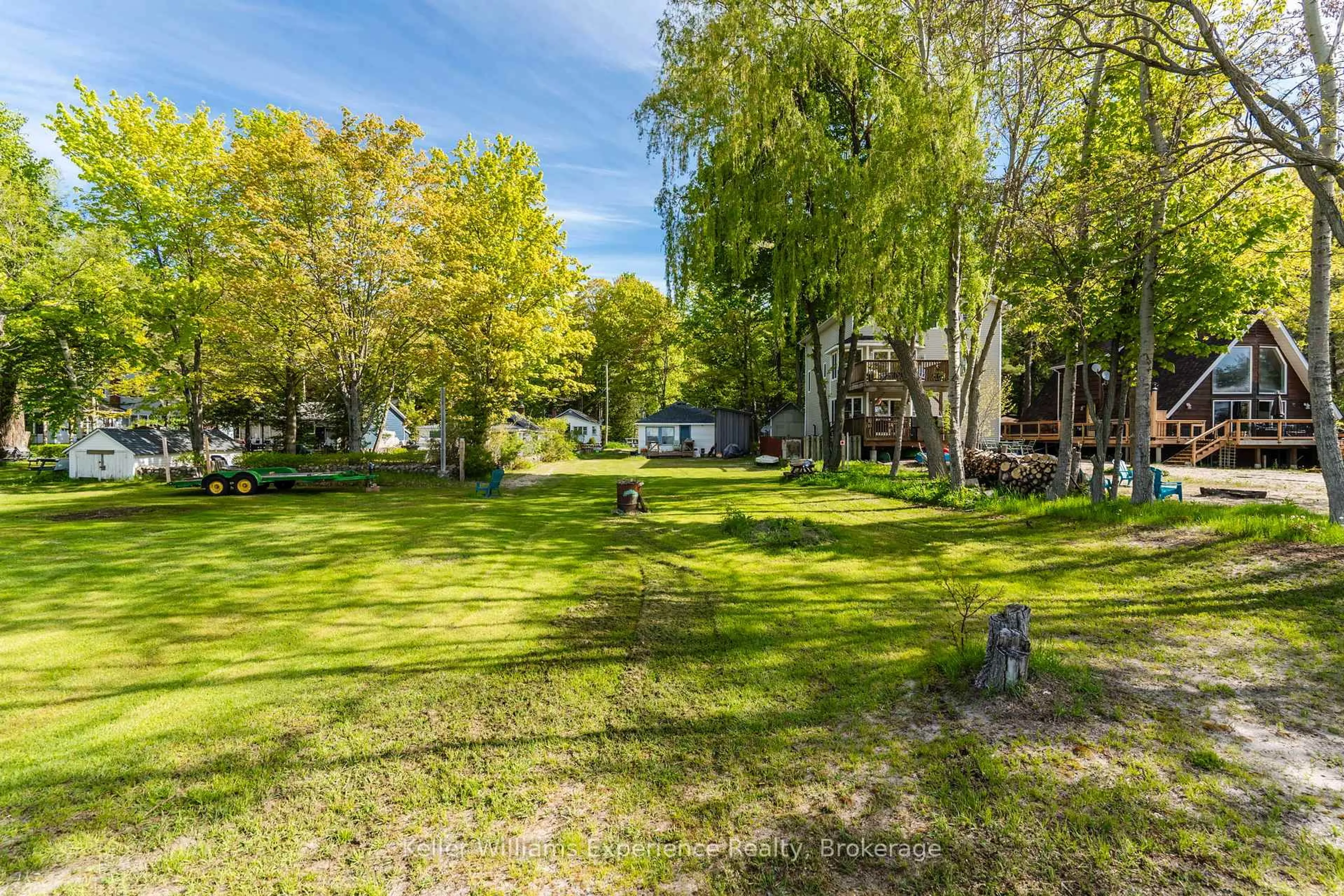 A pic from outside/outdoor area/front of a property/back of a property/a pic from drone, water/lake/river/ocean view for 70 Wahnekewening Dr, Tiny Ontario L9M 0N3