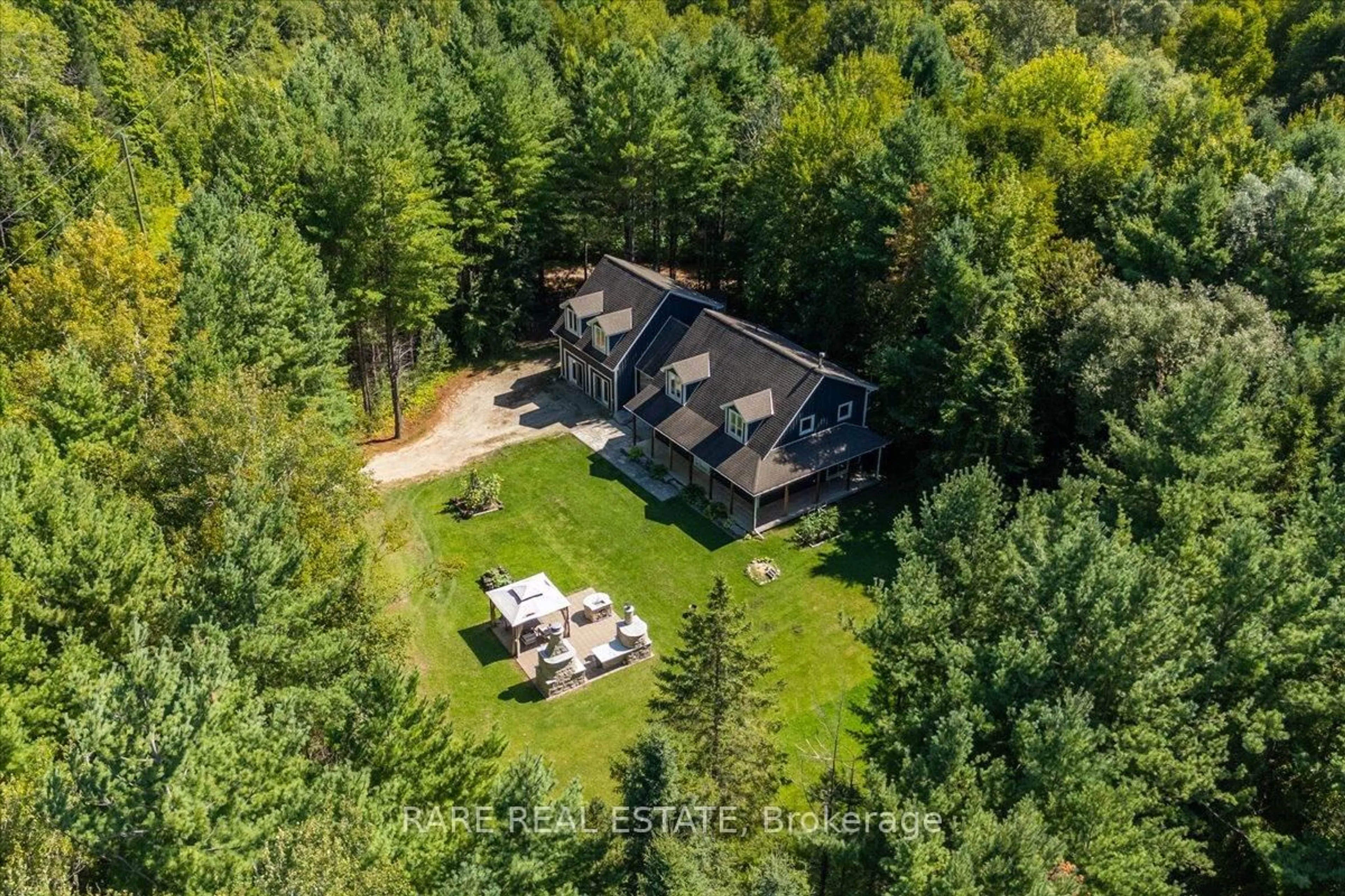 A pic from outside/outdoor area/front of a property/back of a property/a pic from drone, forest/trees view for 6543 Concession Road 2 Rd, Clearview Ontario L0M 1N0