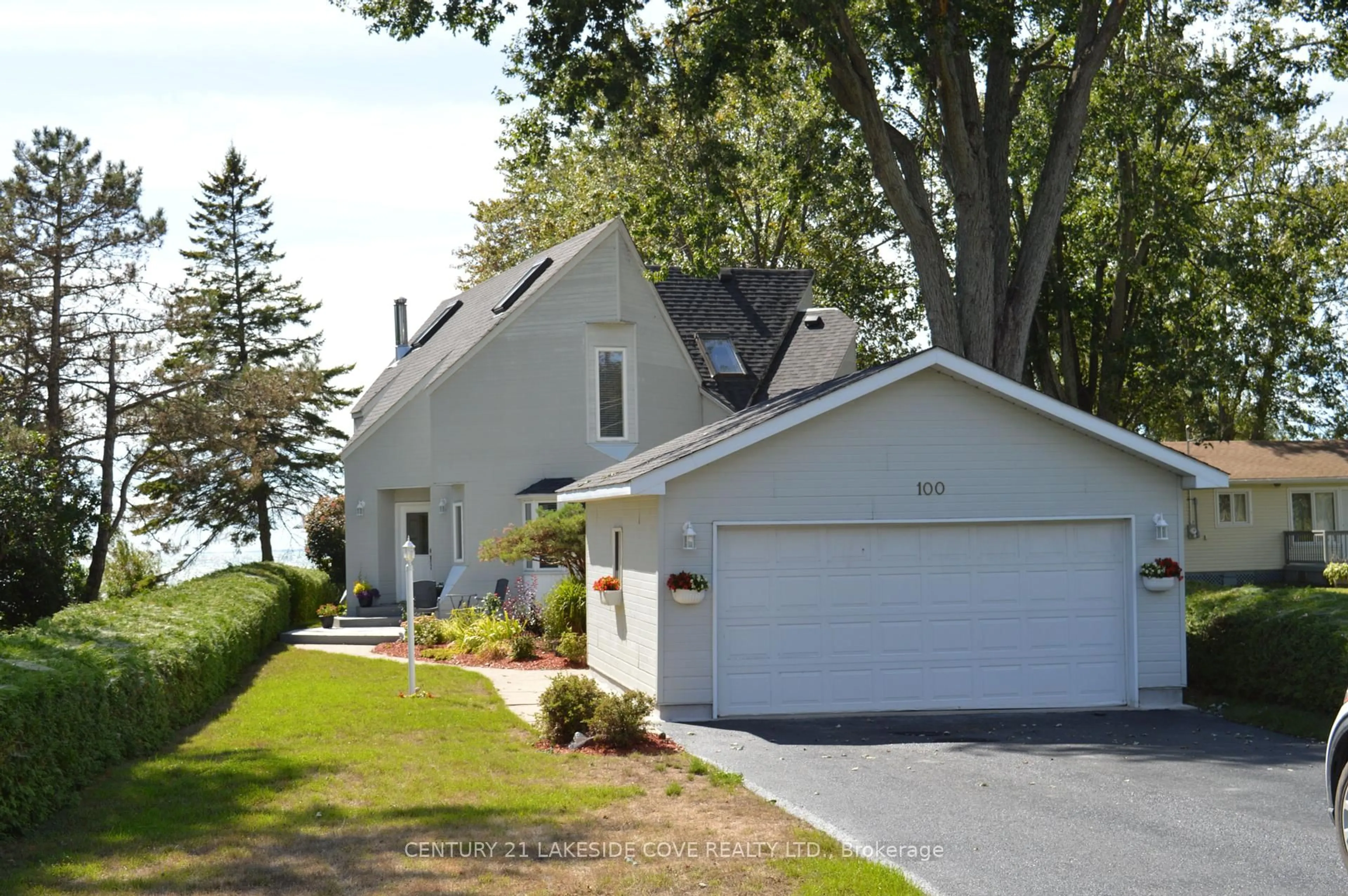 Home with vinyl exterior material, street for 100 Lake Ave, Ramara Ontario L0K 1B0