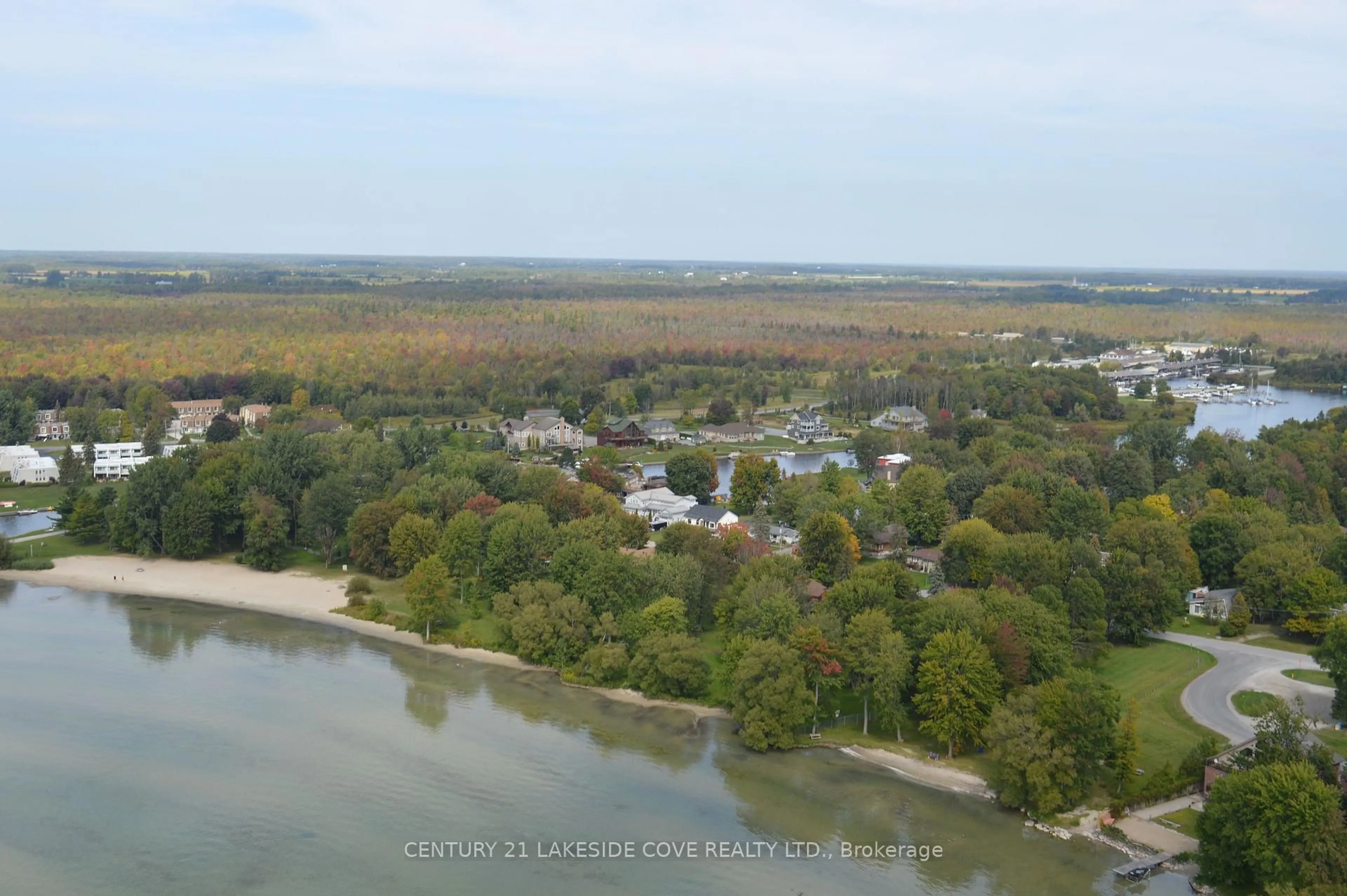 A pic from outside/outdoor area/front of a property/back of a property/a pic from drone, water/lake/river/ocean view for 100 Lake Ave, Ramara Ontario L0K 1B0