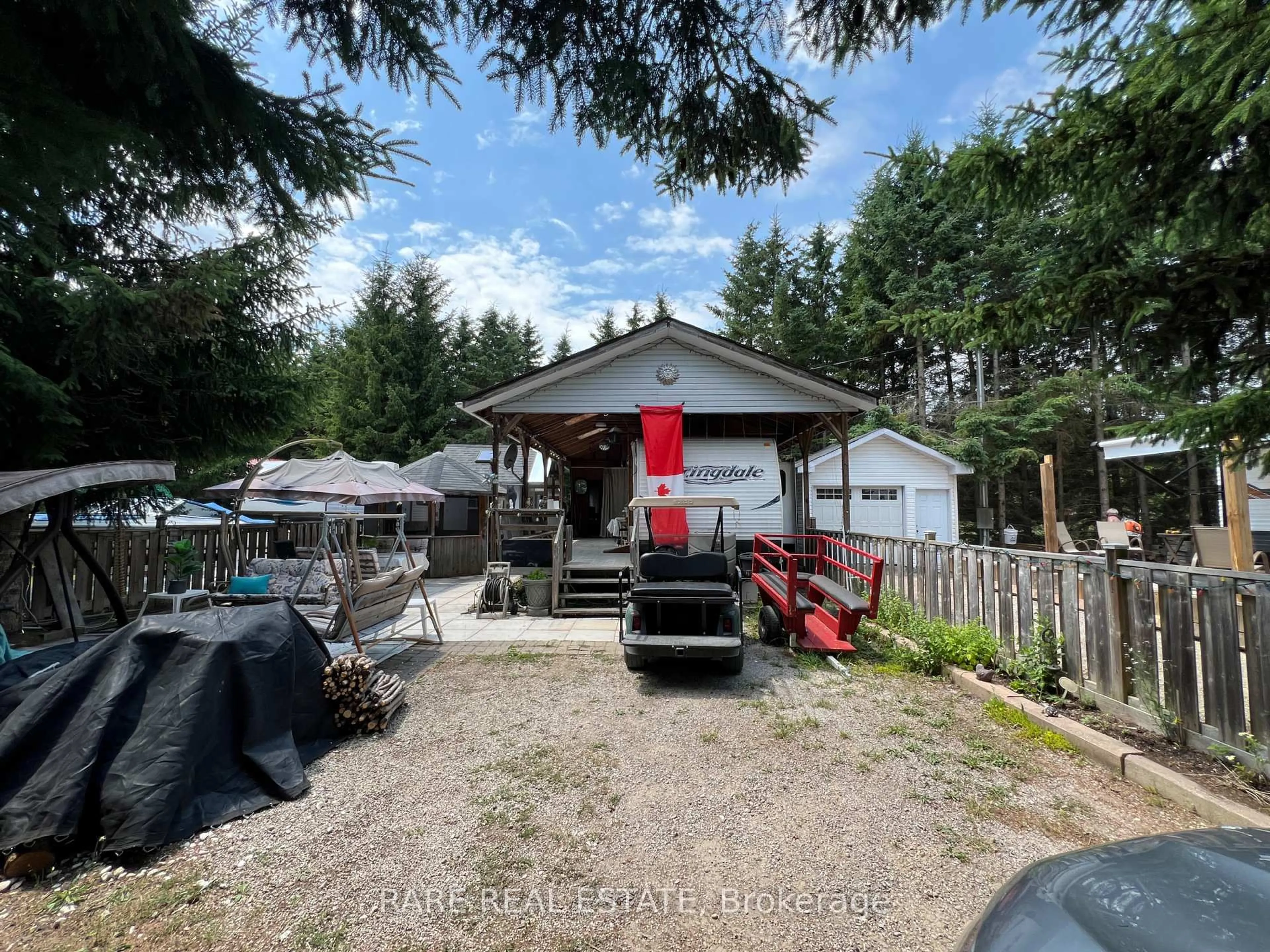 A pic from outside/outdoor area/front of a property/back of a property/a pic from drone, unknown for 75 Bells Park Rd, Wasaga Beach Ontario L9Z 2X2