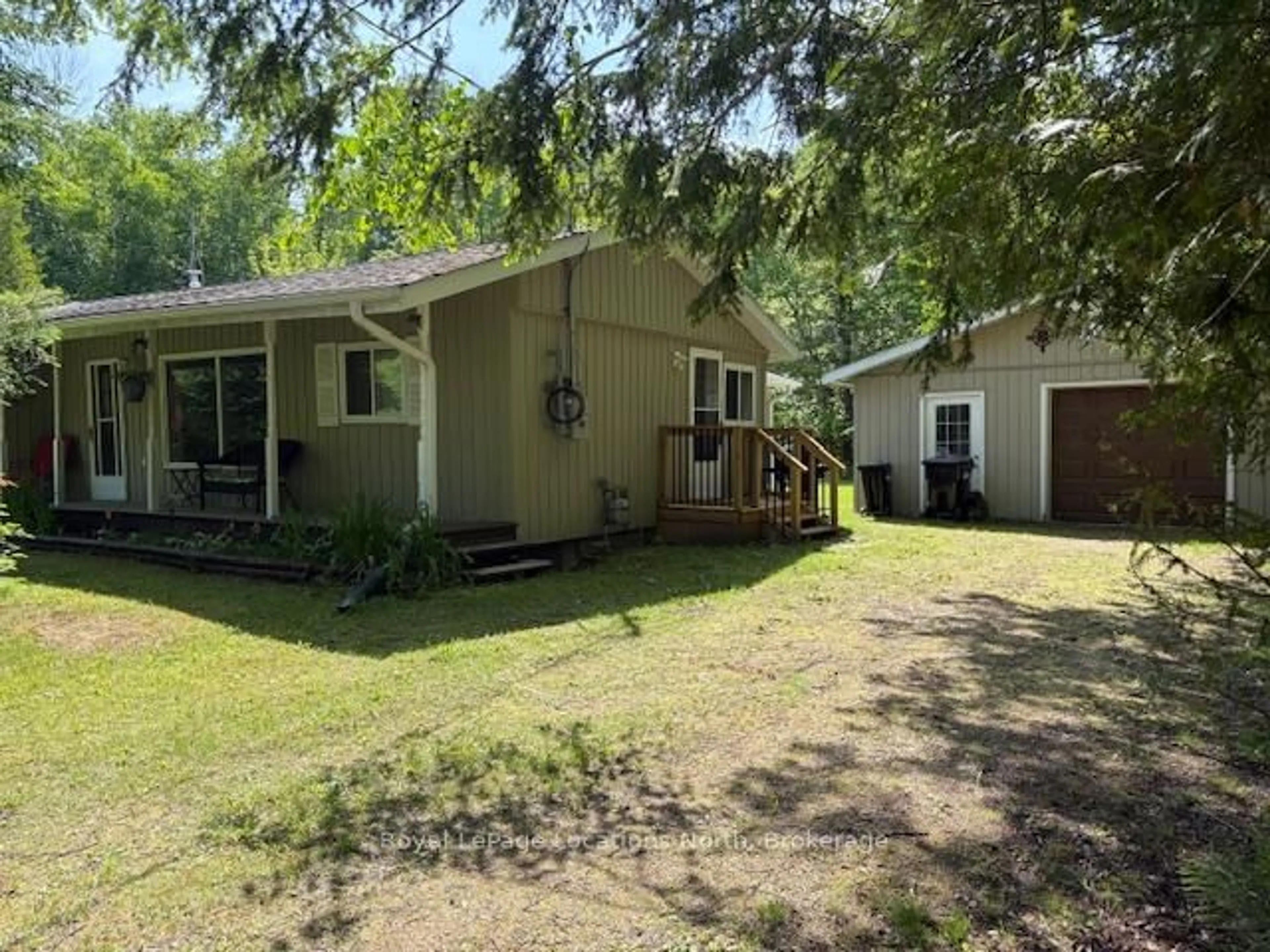 A pic from outside/outdoor area/front of a property/back of a property/a pic from drone, unknown for 2198 Champlain Rd, Tiny Ontario L9M 0C4