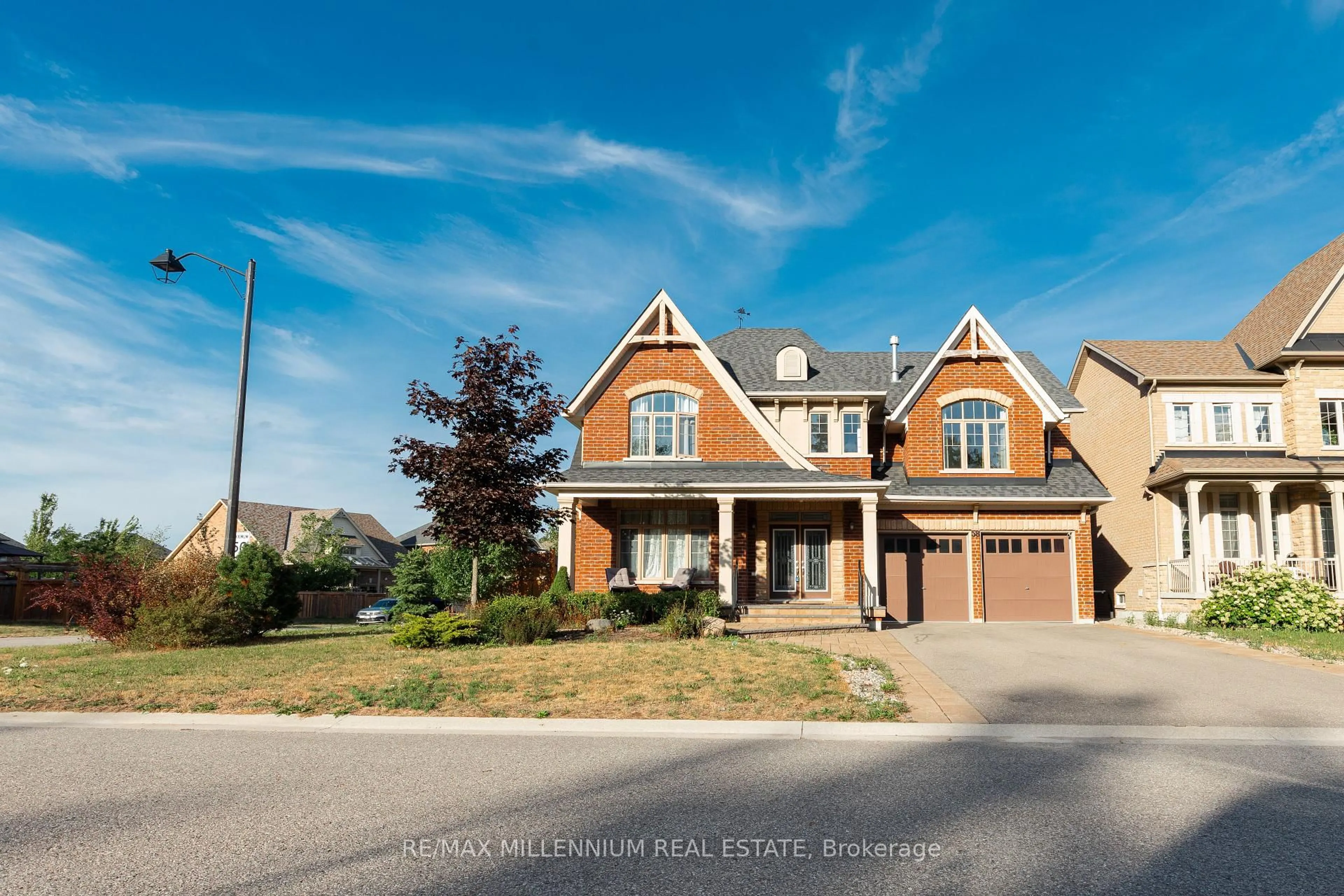 Home with brick exterior material, street for 58 Trail Blvd, Springwater Ontario L9X 0S4