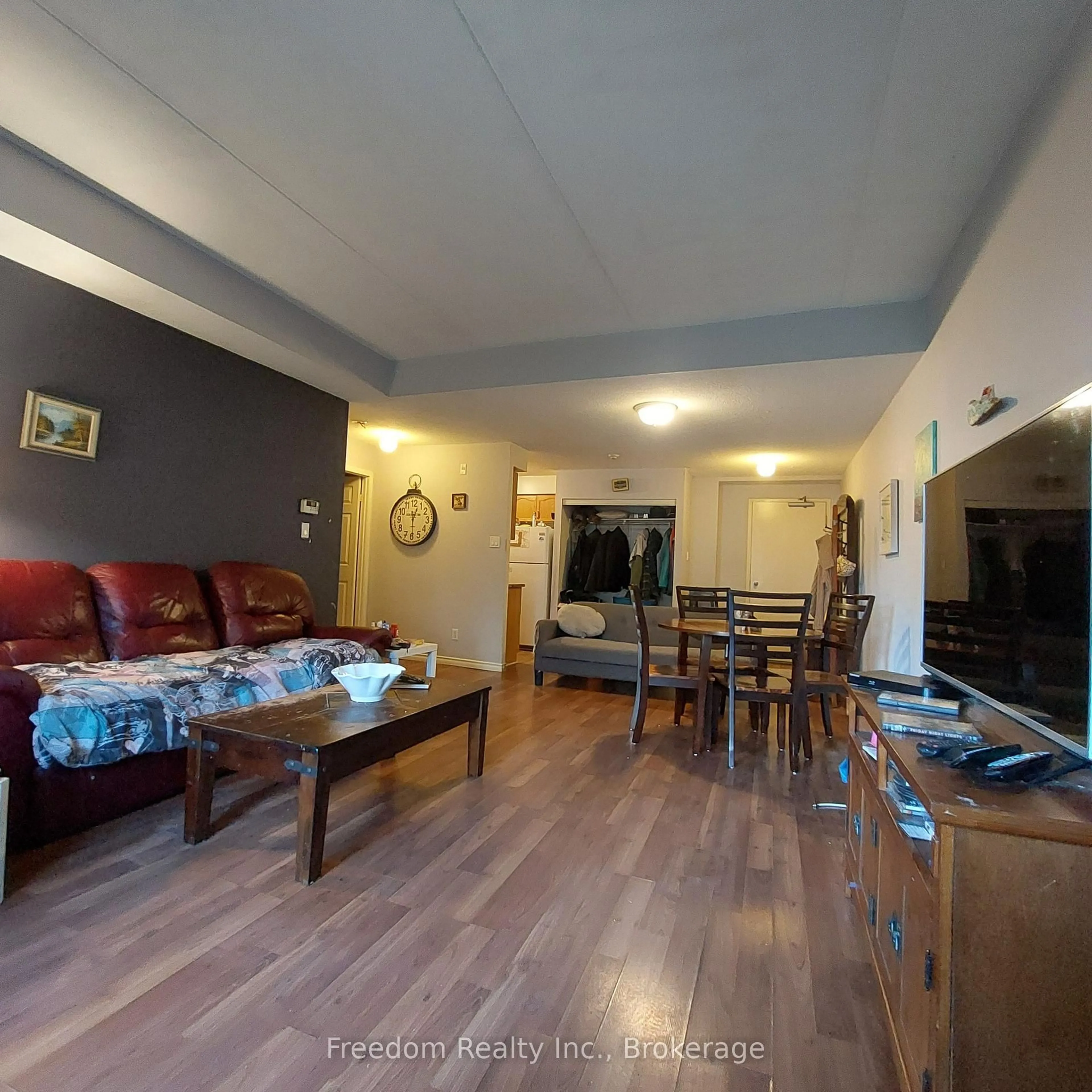 Living room with furniture, unknown for 115 Bond St #107, Orillia Ontario L3V 1J7