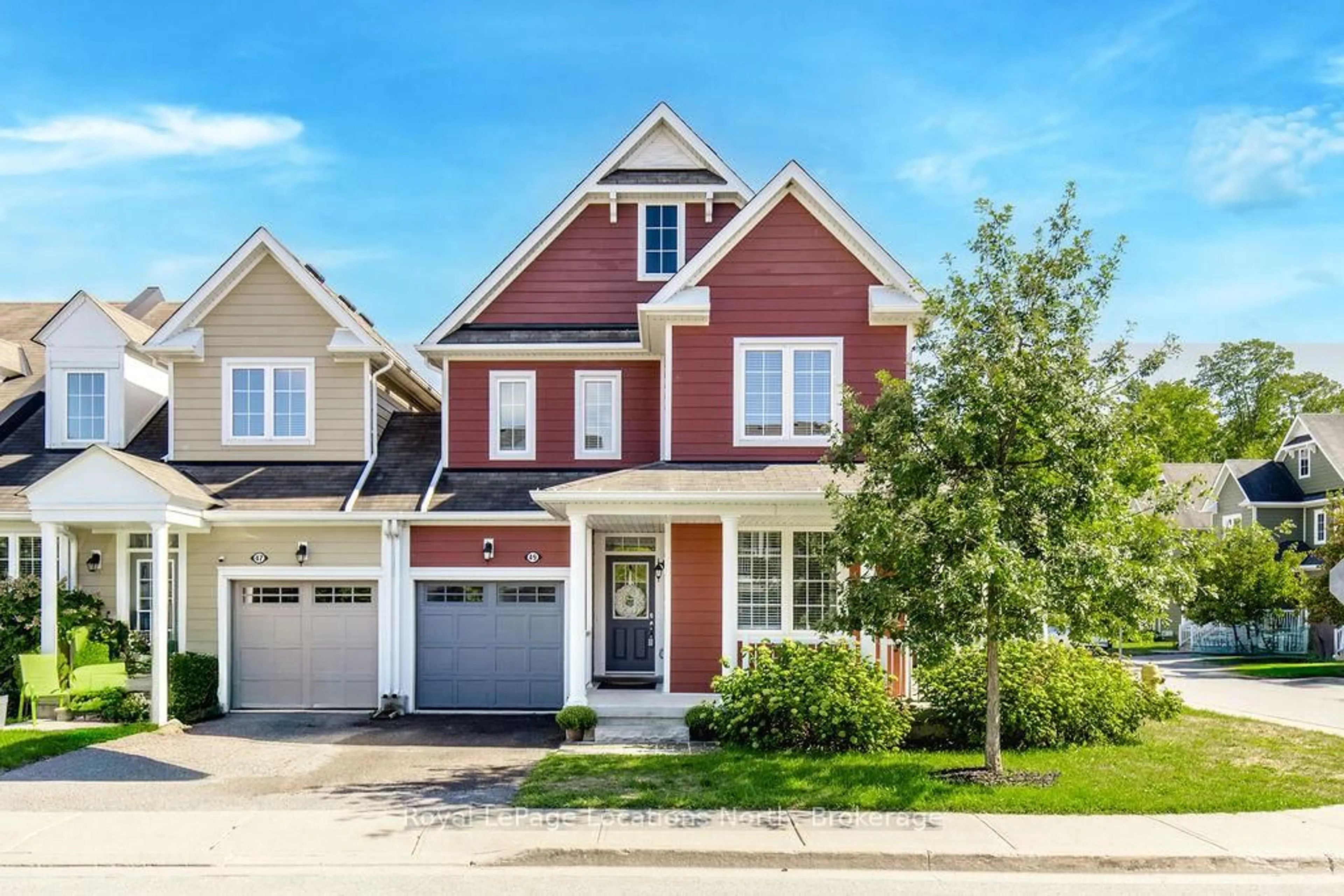 Home with brick exterior material, street for 49 Providence Way, Wasaga Beach Ontario L9Z 0G3