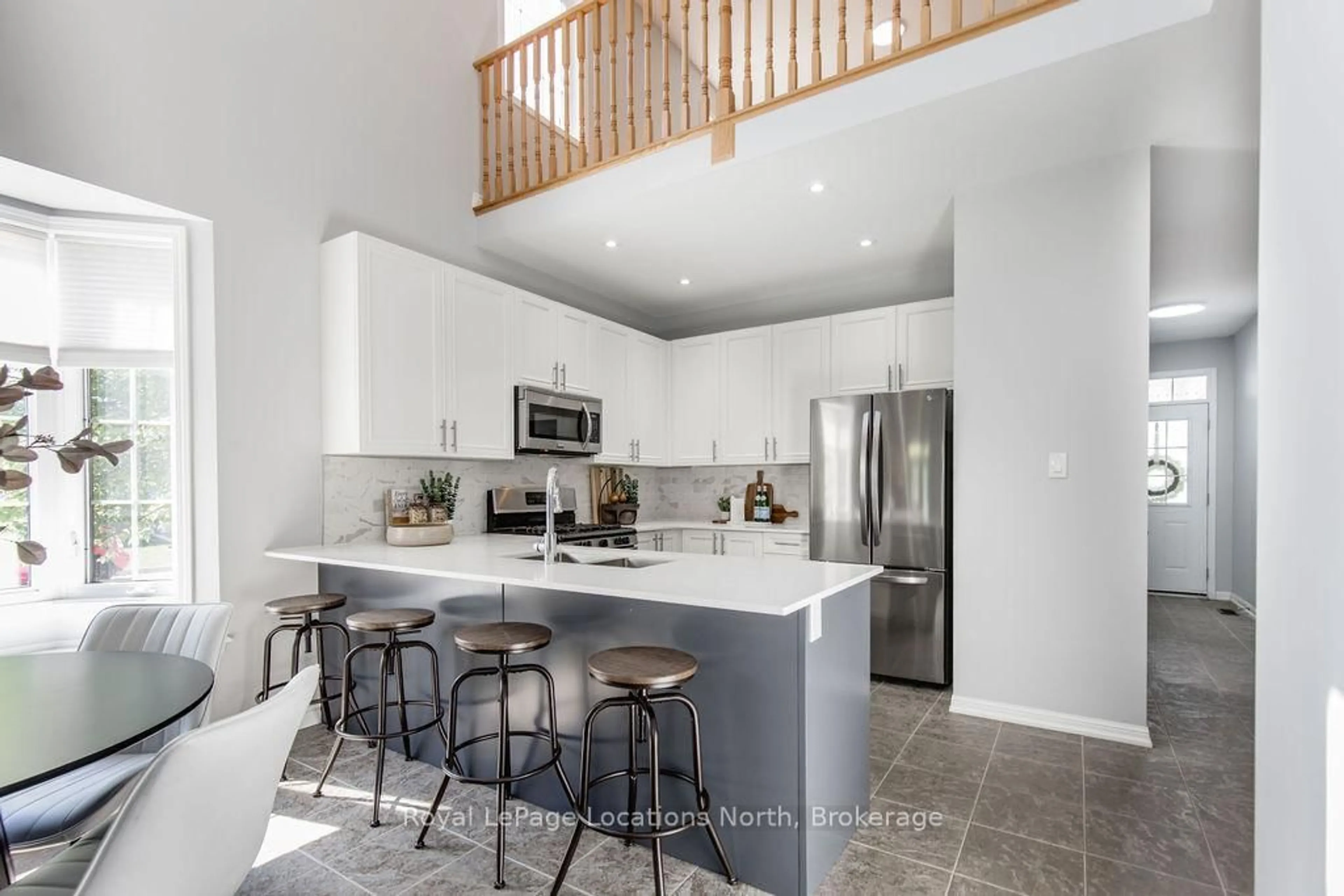 Open concept kitchen, ceramic/tile floor for 49 Providence Way, Wasaga Beach Ontario L9Z 0G3