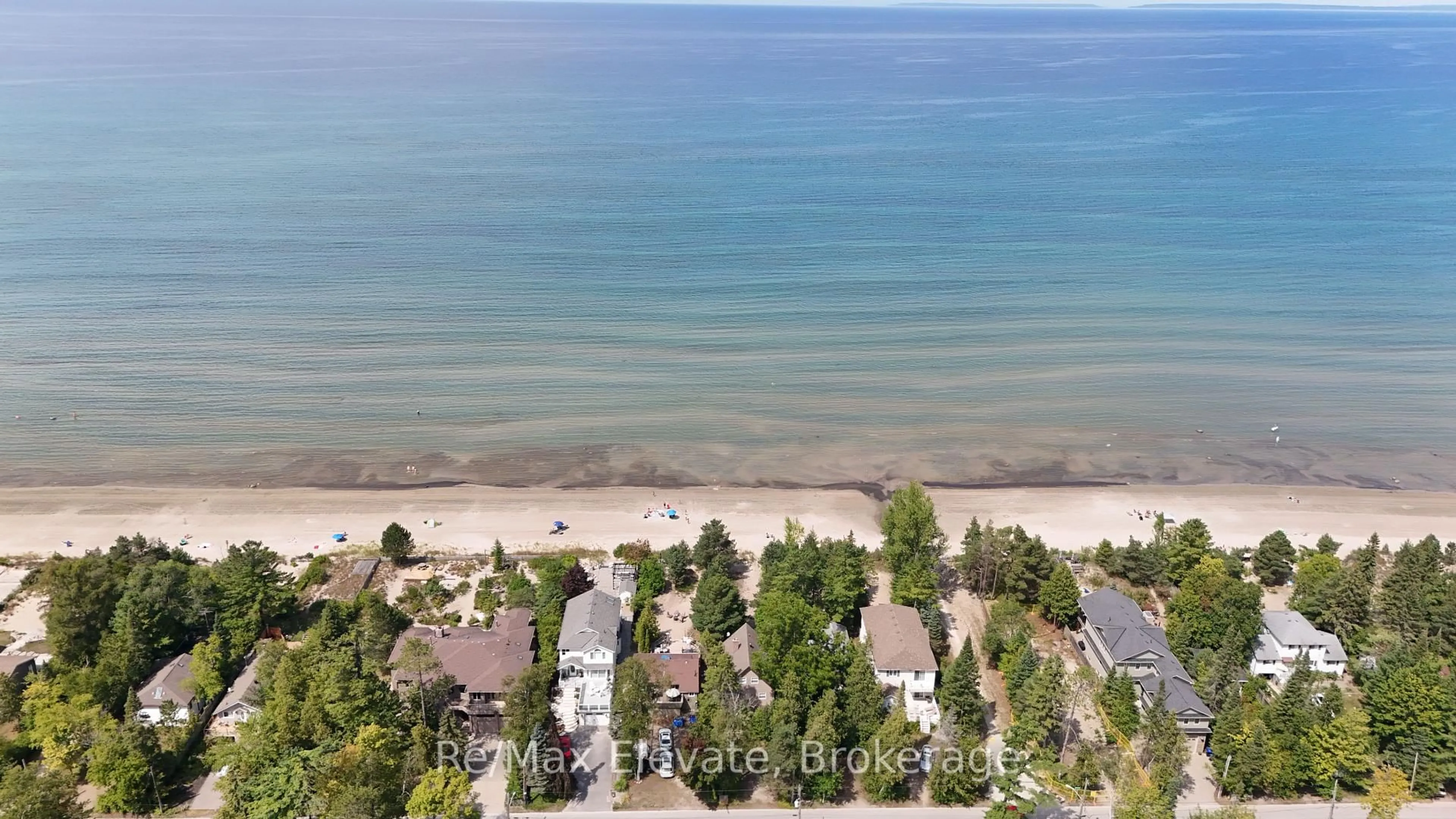 A pic from outside/outdoor area/front of a property/back of a property/a pic from drone, water/lake/river/ocean view for 1679 Shore Lane, Wasaga Beach Ontario L9Z 1W4