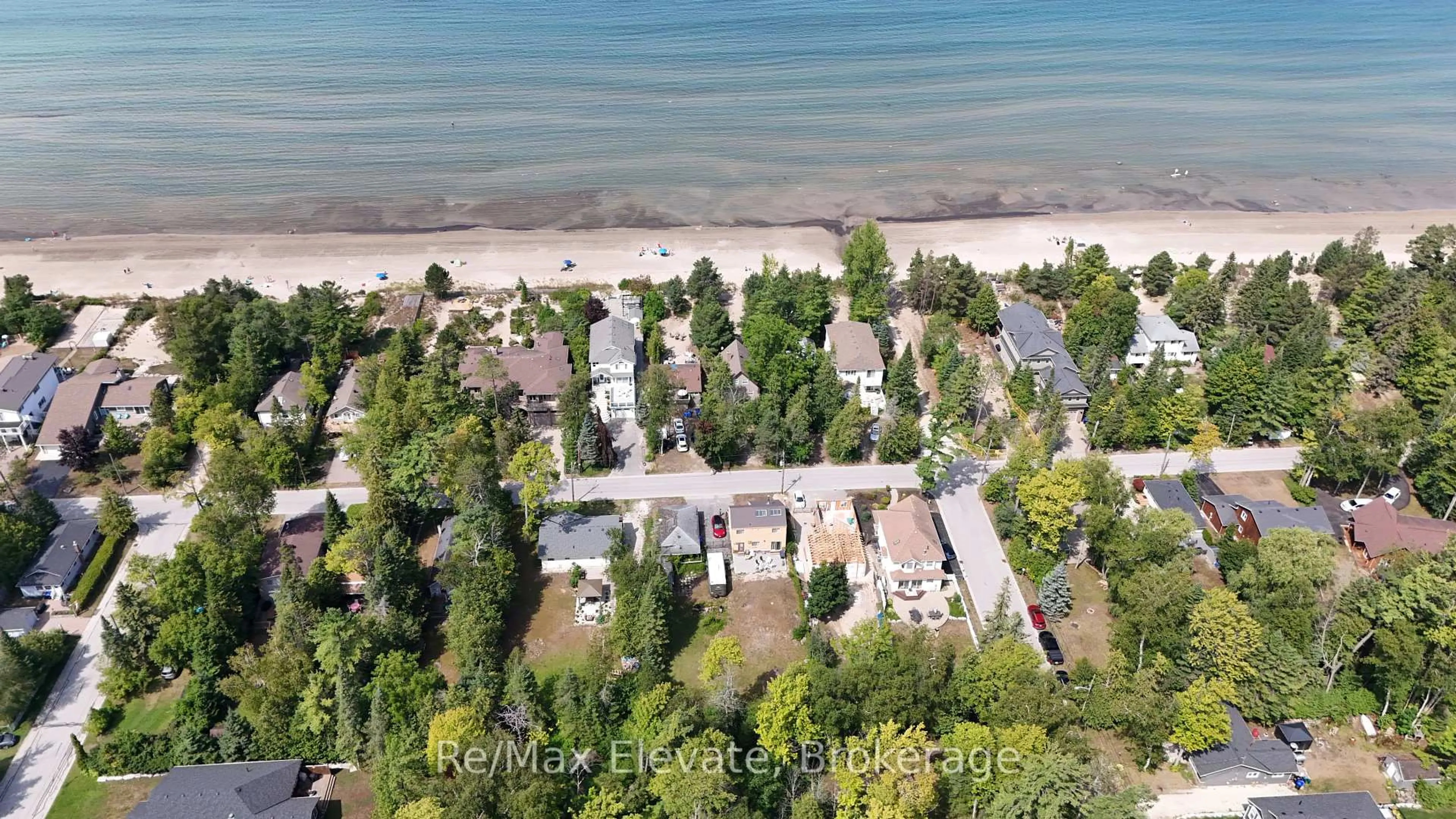 A pic from outside/outdoor area/front of a property/back of a property/a pic from drone, water/lake/river/ocean view for 1683 Shore Lane, Wasaga Beach Ontario L9Z 1W4