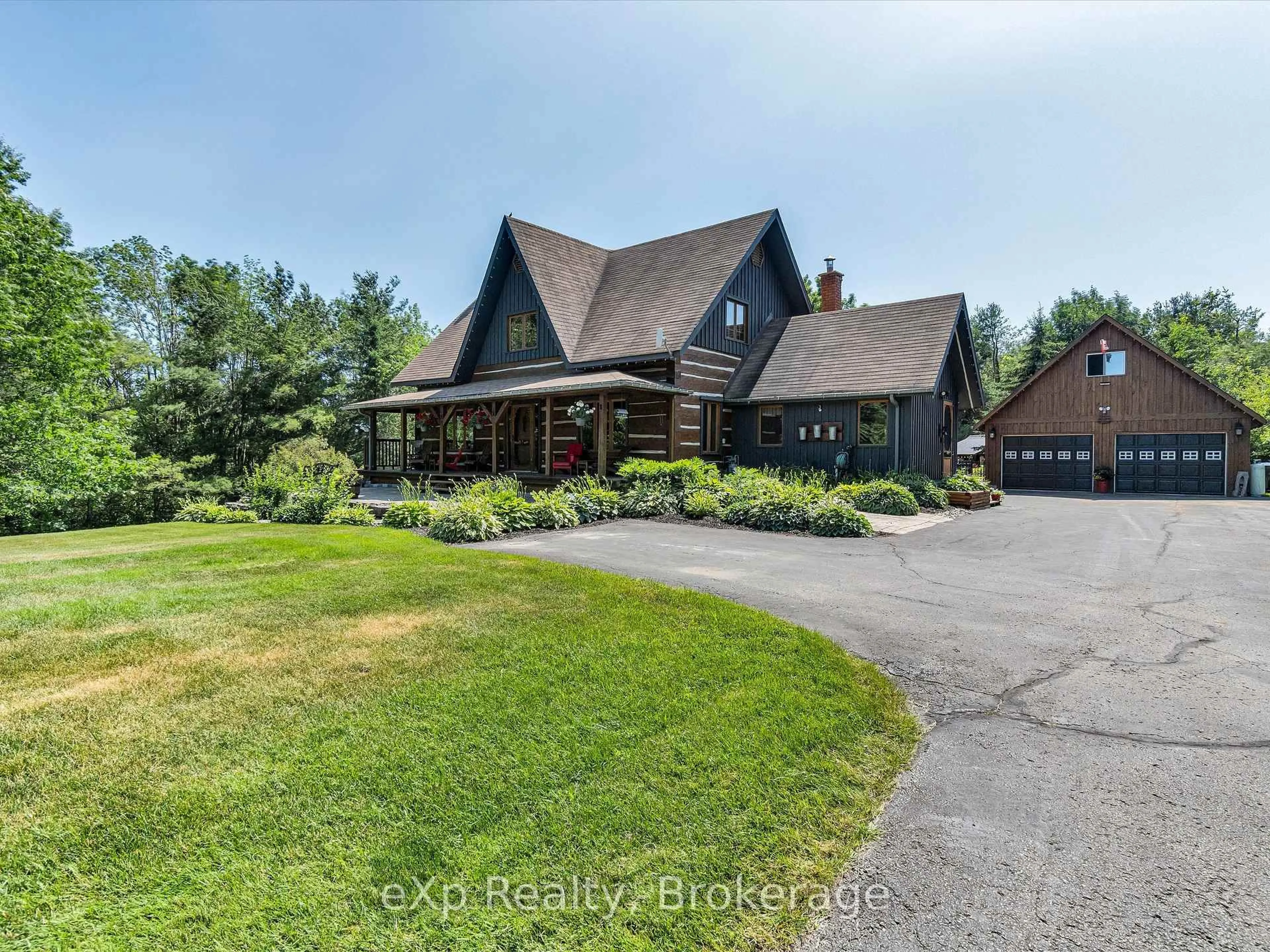 A pic from outside/outdoor area/front of a property/back of a property/a pic from drone, water/lake/river/ocean view for 358 1 Line, Oro-Medonte Ontario L0L 2L0