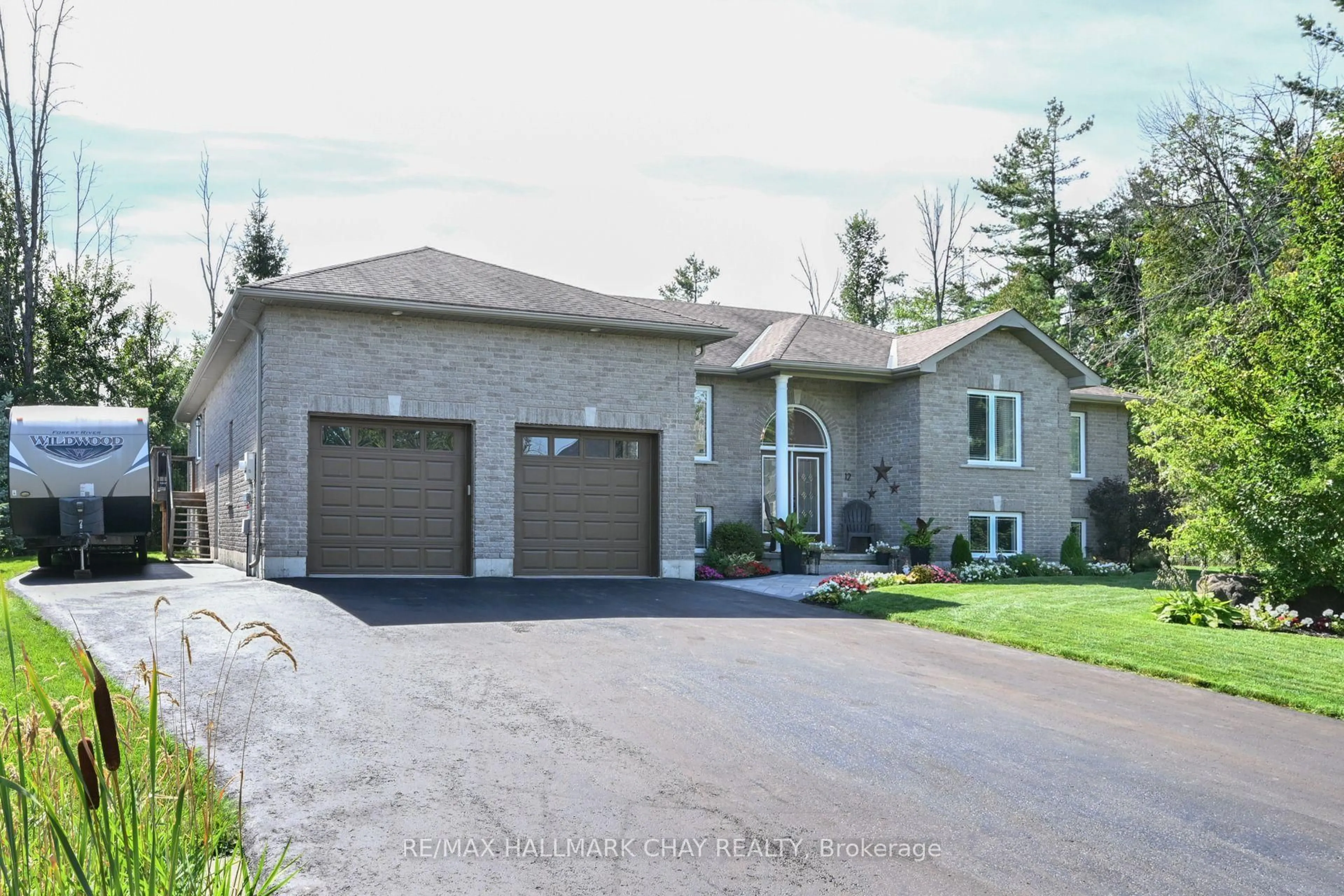 Home with brick exterior material, street for 12 Symond Ave, Oro-Medonte Ontario L0L 2E0